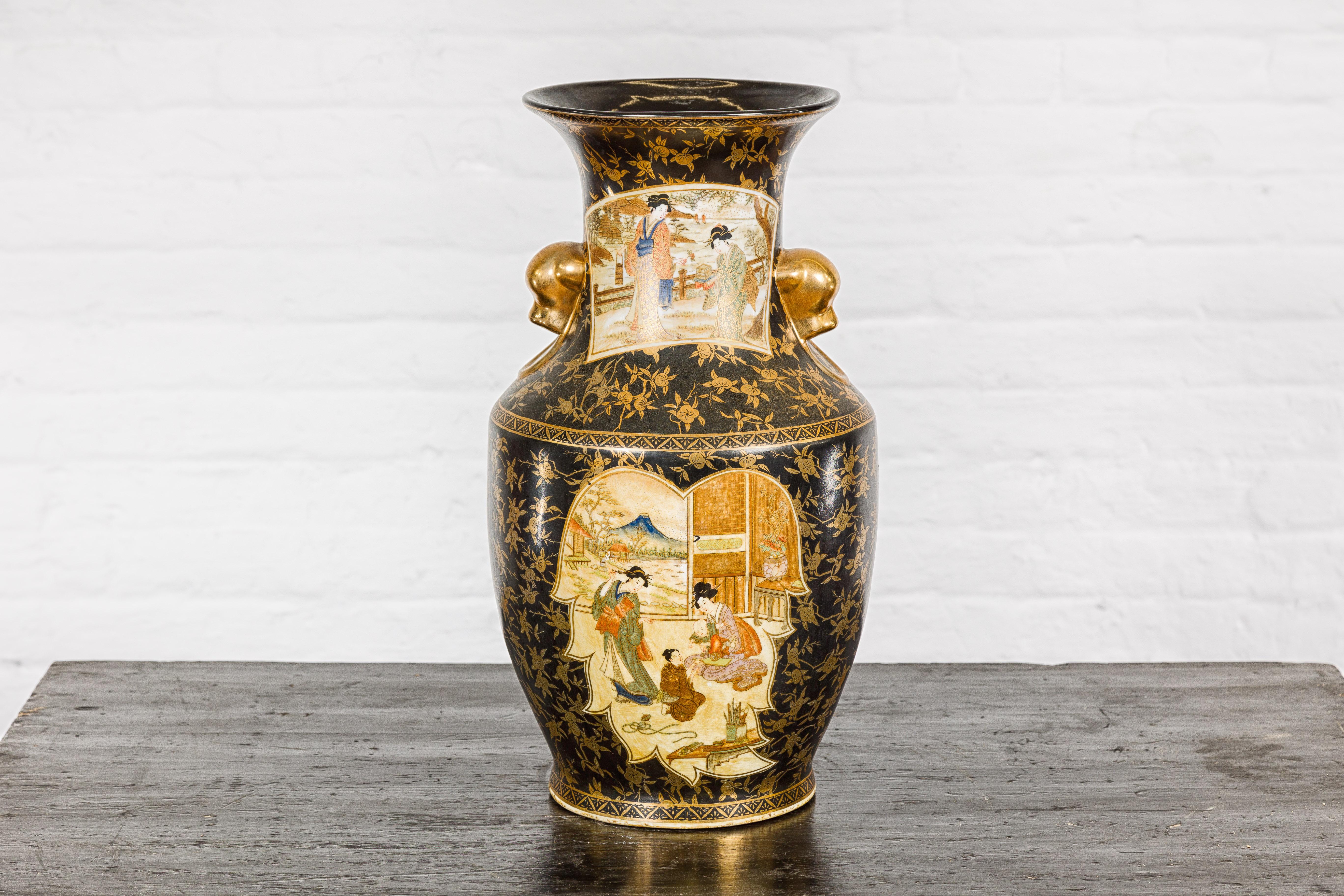 Chinese Japanese Inspired Black and Gold Vase with Family Scenes and Foo Dog Handles For Sale