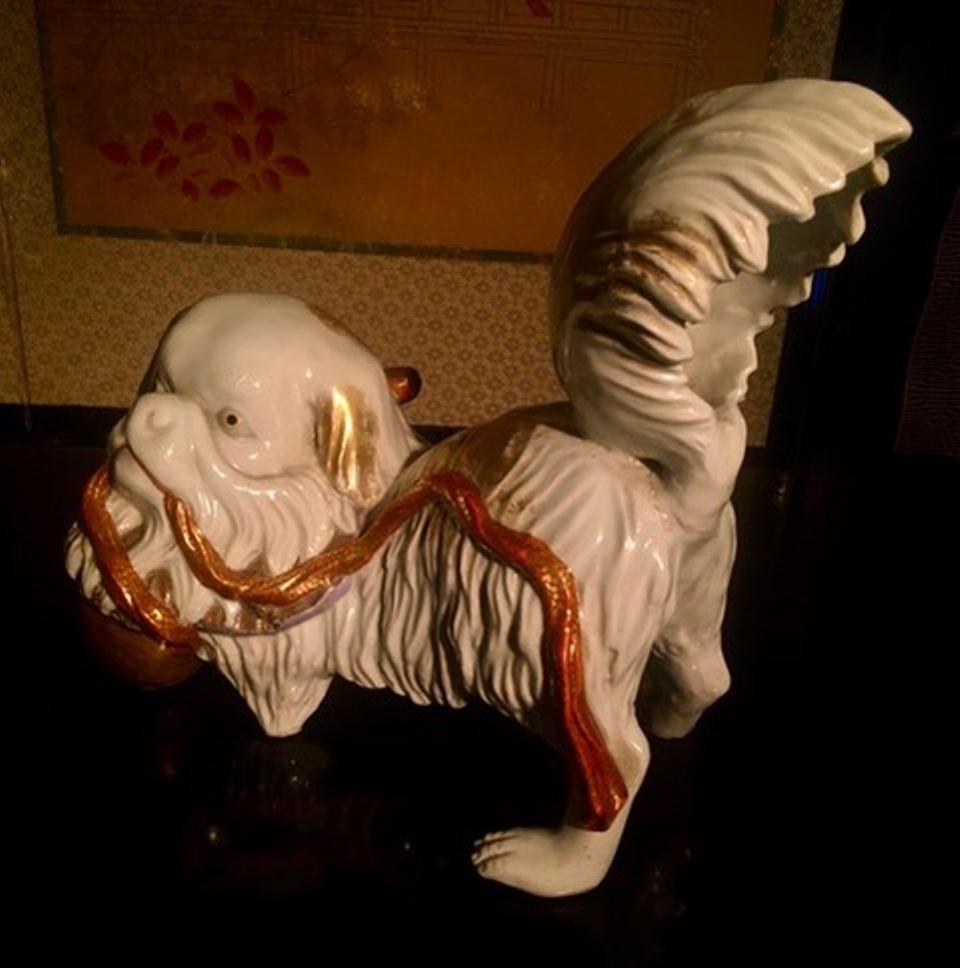 Japanese Kutani Porcelain Pekinese Dog Playing with Shinto Shrine Bell For Sale 1