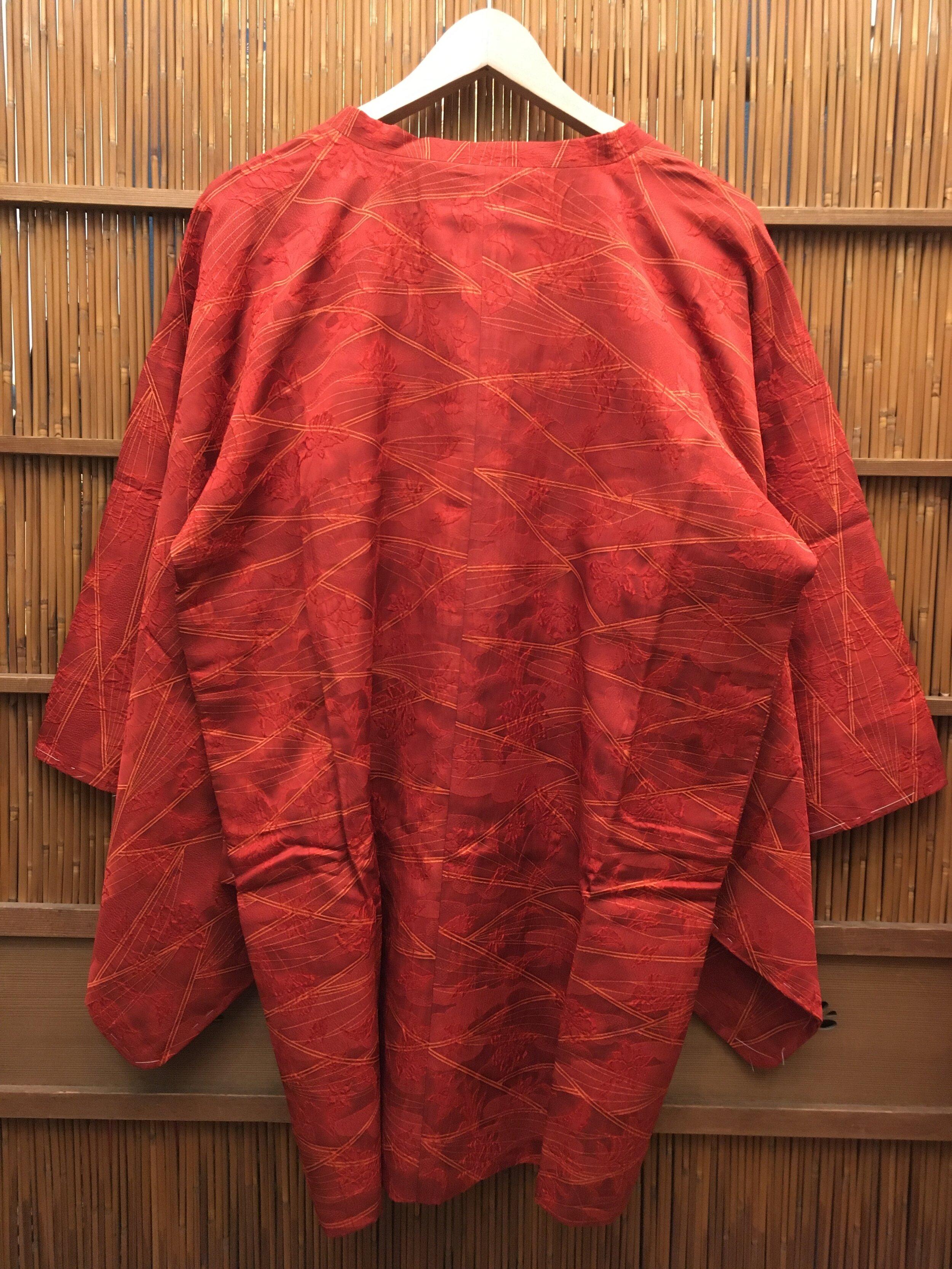 This is a thin coat which we ware on the Kimono. It is for the spring. 
This kind of coat is called Michiyuki in Japanese.
This coat was made in Japan around 1980s in Showa era.

Dimensions:
Total wide : 78 cm
Hight: 68 cm
Sleeve wide : 34 cm
Sleeve