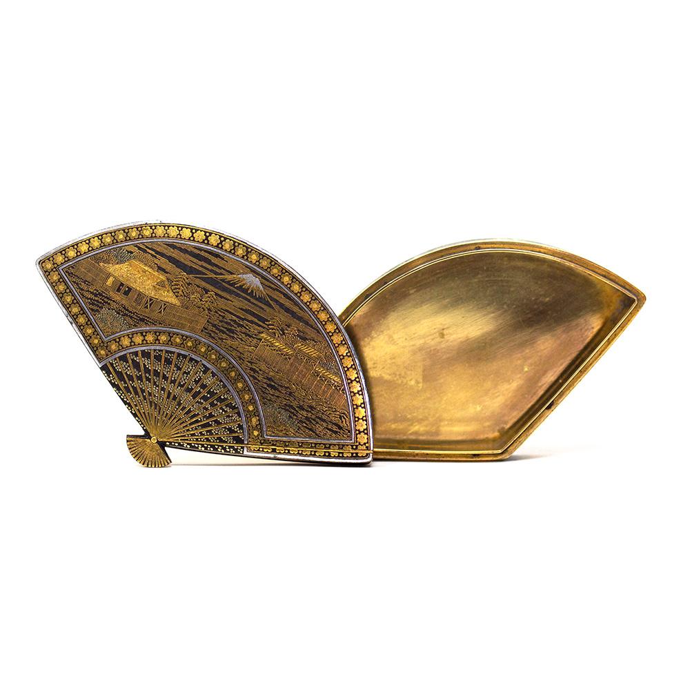 Fine Japanese Meiji period damascene box in the shape of an open fan. The box of exceptional quality decorated throughout with mixed metals encased within the open fan design. The top scene showing a vast landscape with mount fuji to the center with