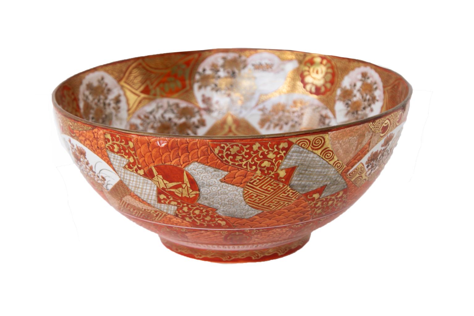 Japanese Kutani bowl, with the interior having multiple vignettes depicting a fan, gourd, vase, and plate patterns with birds and flowers done in very fine detail. The center panel shows three court ladies with children surrounded by gilt brocade
