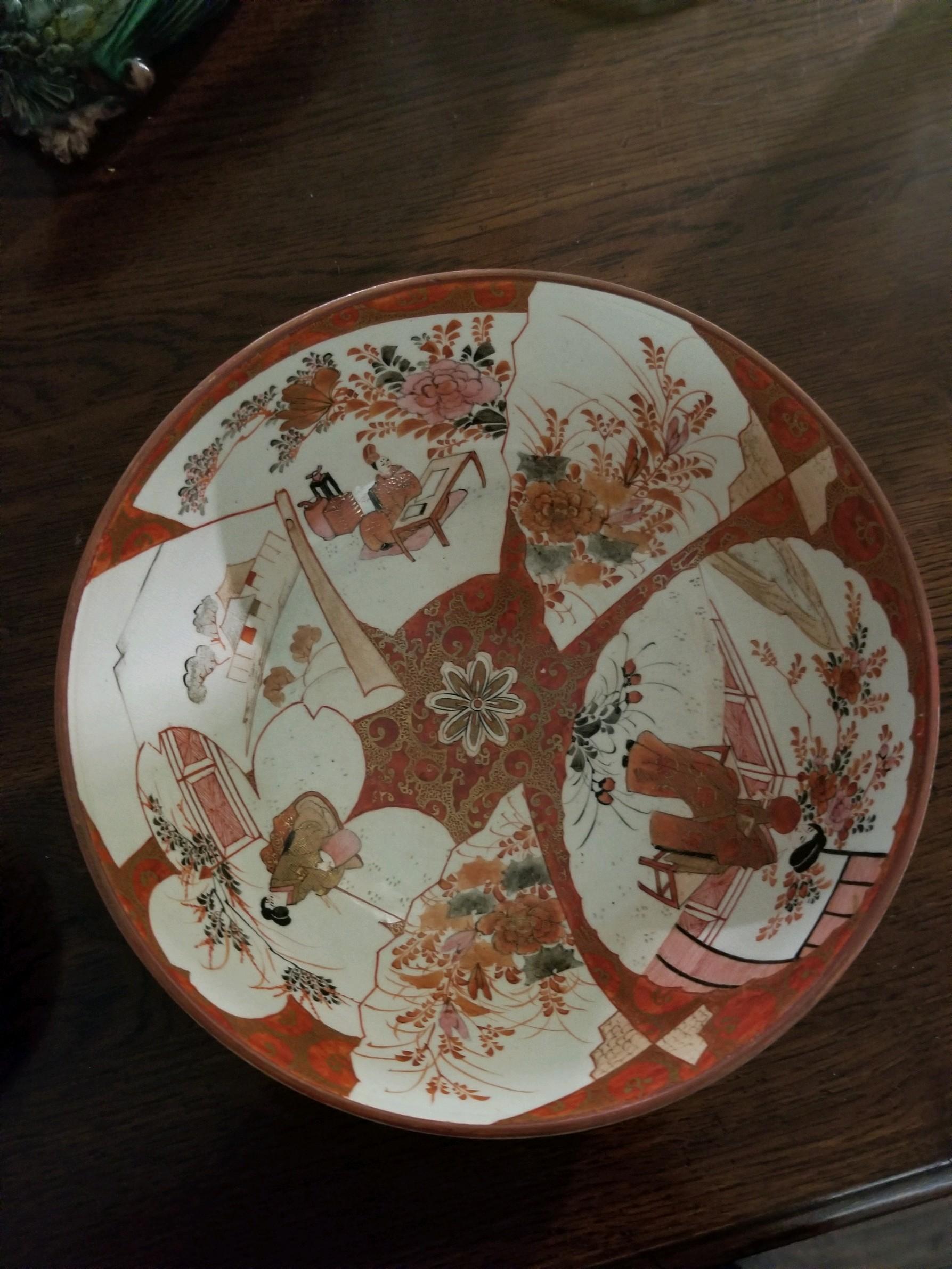 Wonderful and Classic Japanese Kutani Bowl in the proper color with the Classic butterfly pattern on the outside. Scenic and beautiful, it will stun on a cocktail table or on a lit pedestal. Place on a dining table as the center focal point. Many of