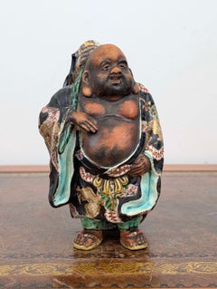 Japanese Kutani Figure of Hotei with Polychrome Enamels, Late Meiji Period