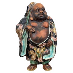 Japanese Kutani Figure of Hotei with Polychrome Enamels, Late Meiji Period