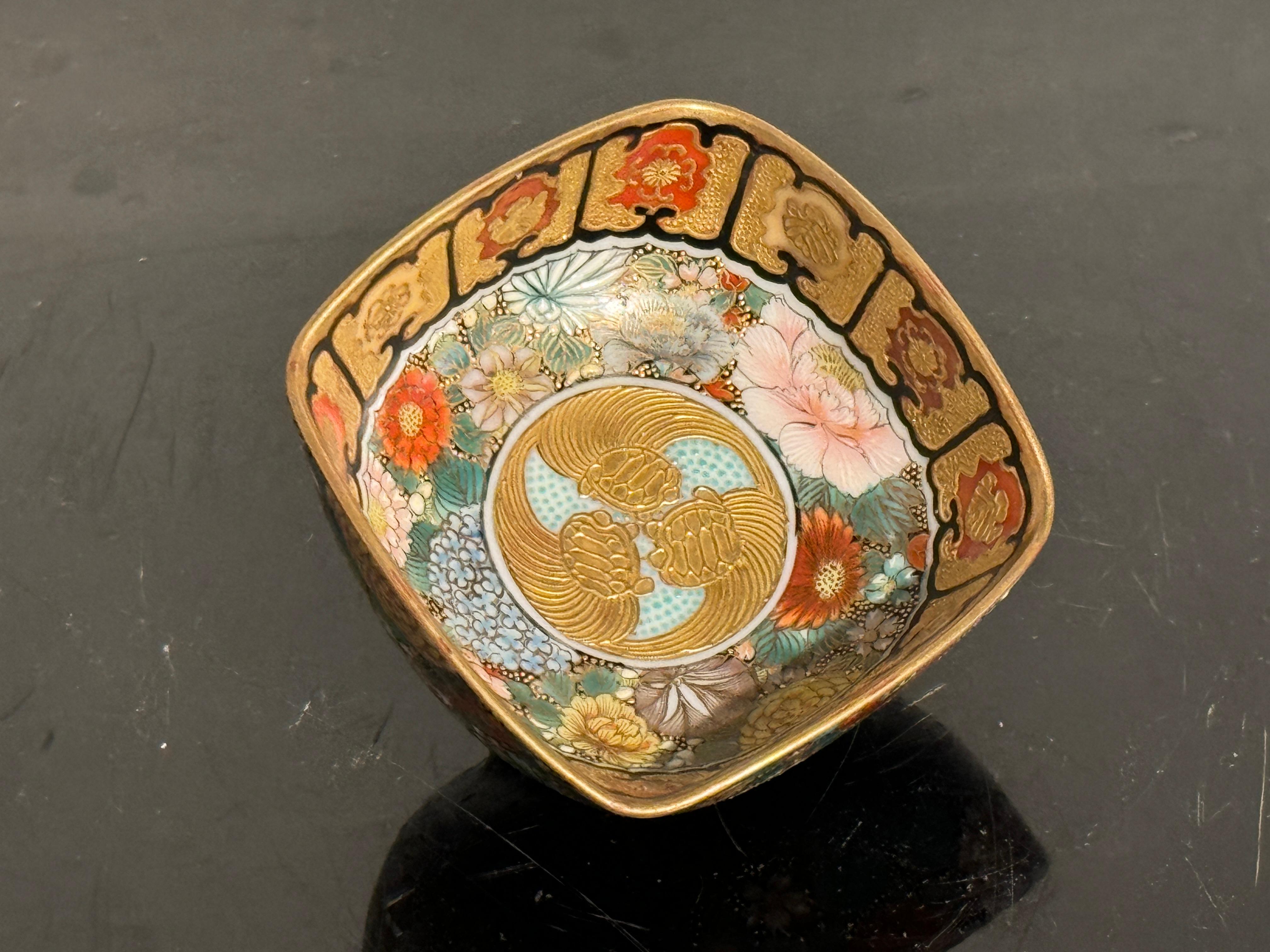 A fantastic small Japanese Kutani porcelain sake cup of square shape and decorated with a millefleurs pattern, Taisho Period (1912 - 1926), circa 1920, Japan. 

The small square cup set on a short recessed foot. The fine porcelain painted all over