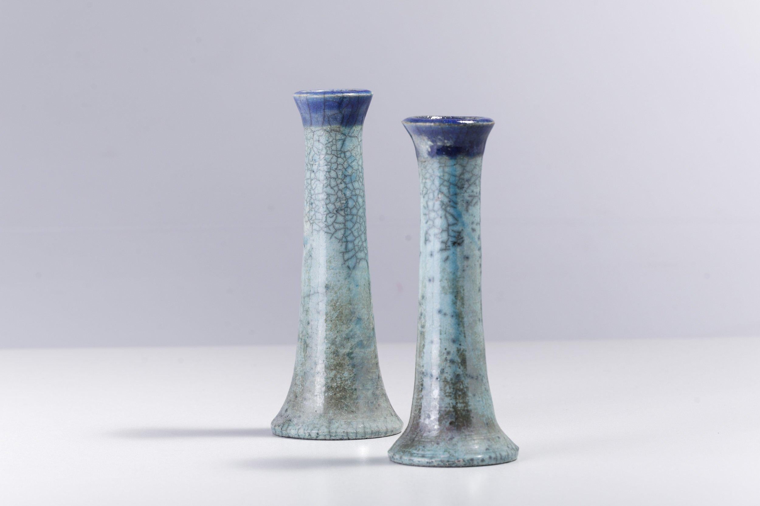 Stelo candle holders

Captivating hues of bold visual impact make these two candle holders one-off pieces of unprecedented artistic charm. Defined by exquisite shades of blue and patchwork of radiating cracks of unique character, both pieces are