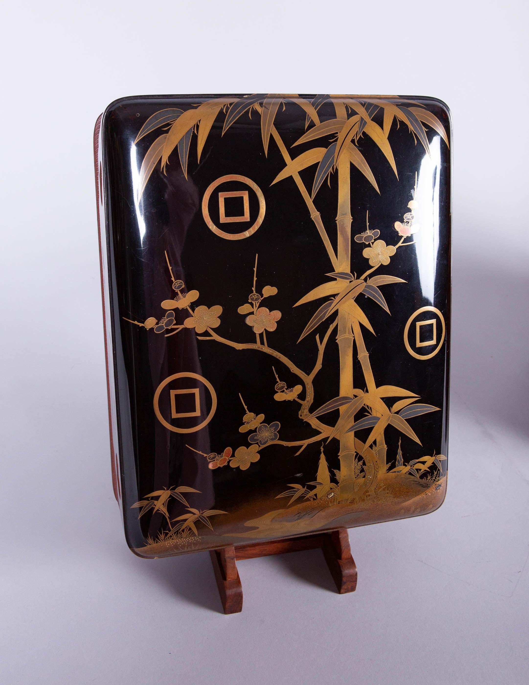 19th Century Japanese Lacquer Box with Bamboo, Plum, and Family Crest For Sale