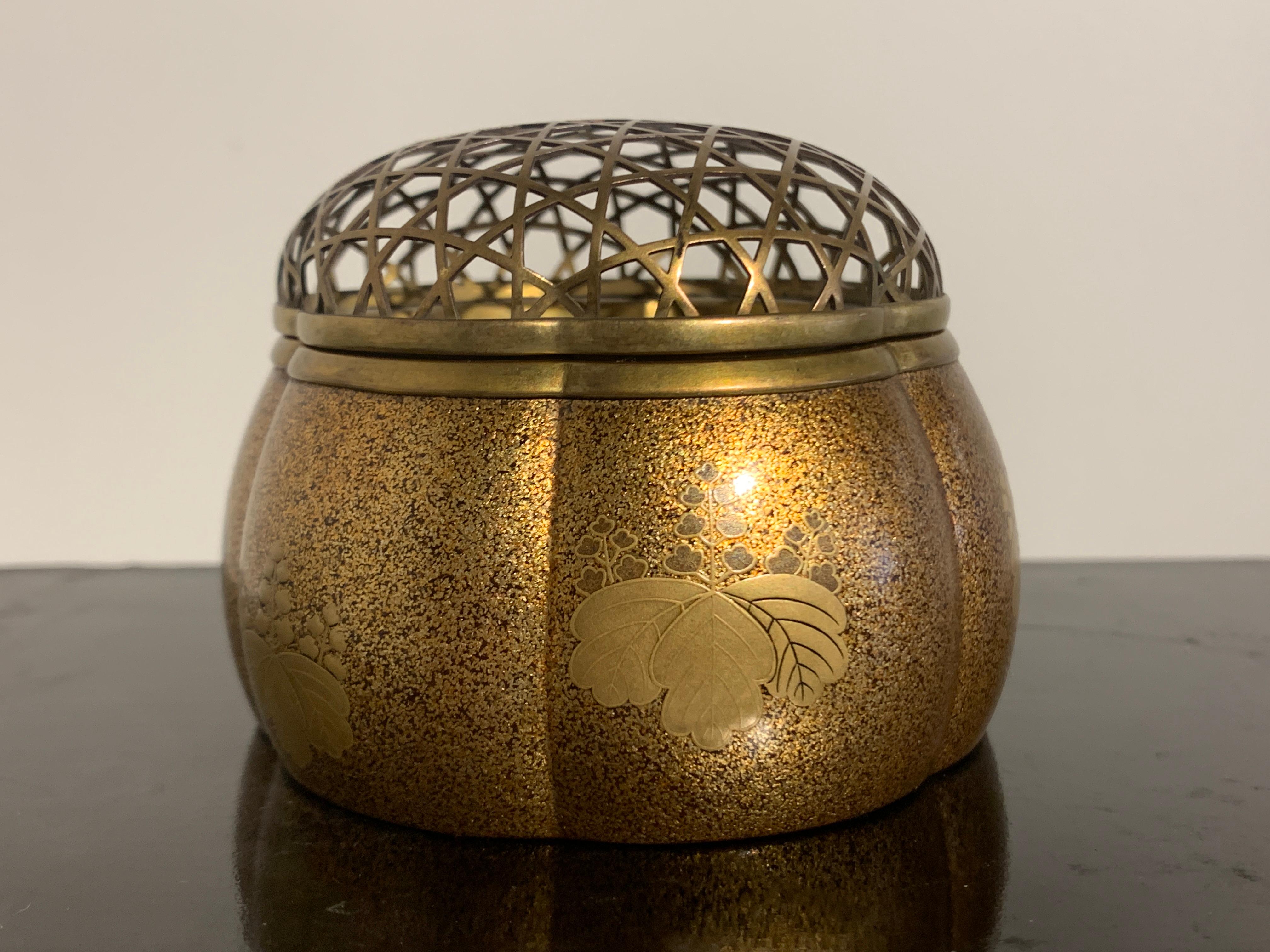 An exceptionally fine Japanese melon form lacquer incense burner, Akoya koro, featuring the Toyotomi Mon (family crest), Edo Period, 18th century, Japan.

The fine censer of lobed, melon form, called an Akoya koro. The koro, or incense burner, is