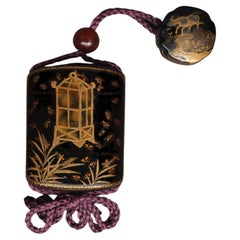 Japanese lacquer inrô 印籠 with golden maki-e firefly design with matching netsuke