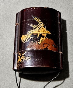 Lacca giapponese Inro con maschera Netsuke Okame Periodo Meiji