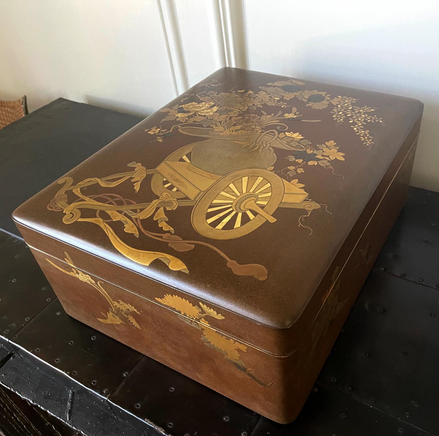 A large Japanese lacquer box with elaborate Maki-e design from Meiji period, (mid-late 19th century). The generous size of the box was reserved for paper document and called Ryoshibako in Japanese. The cover of the lid is decorated with a