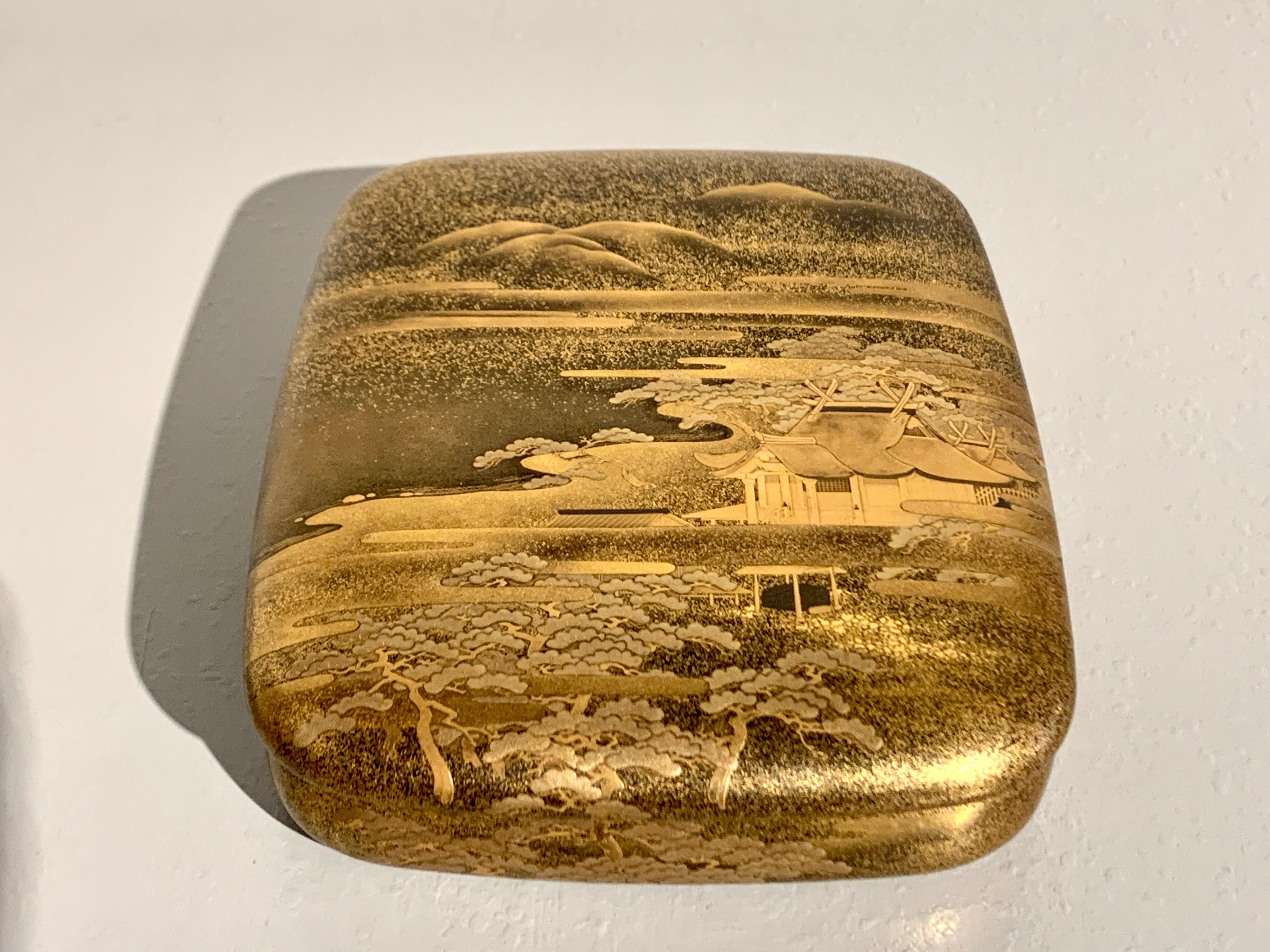 A fine and elegant Japanese lacquer box for writing implements or stationery, suzuribako, with an image of a Shinto shrine, Edo Period, mid-19th century, circa 1840, Japan.

The exquisite suzuribako features rounded corners and a slightly domed,