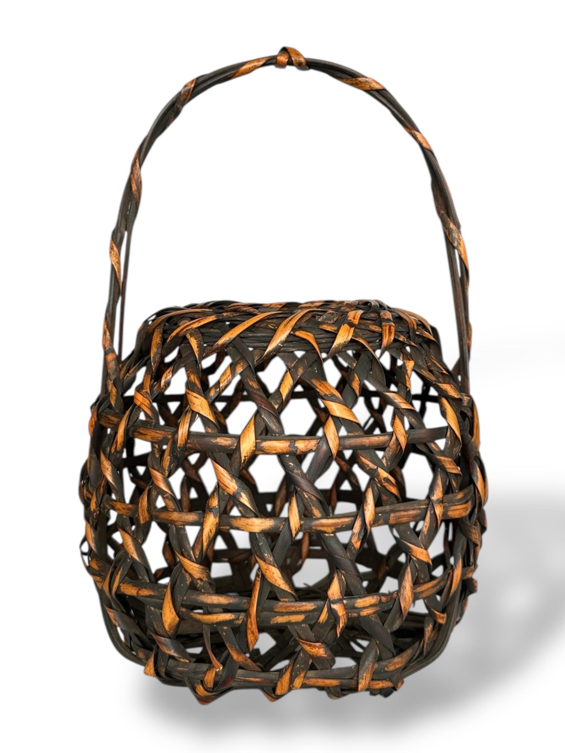 Hand-Woven Japanese Lacquered Bamboo Basket with Twisted Handle For Sale