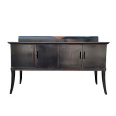 Japanese lacquered Black Cabinet , brass handles and woodcuts with orient