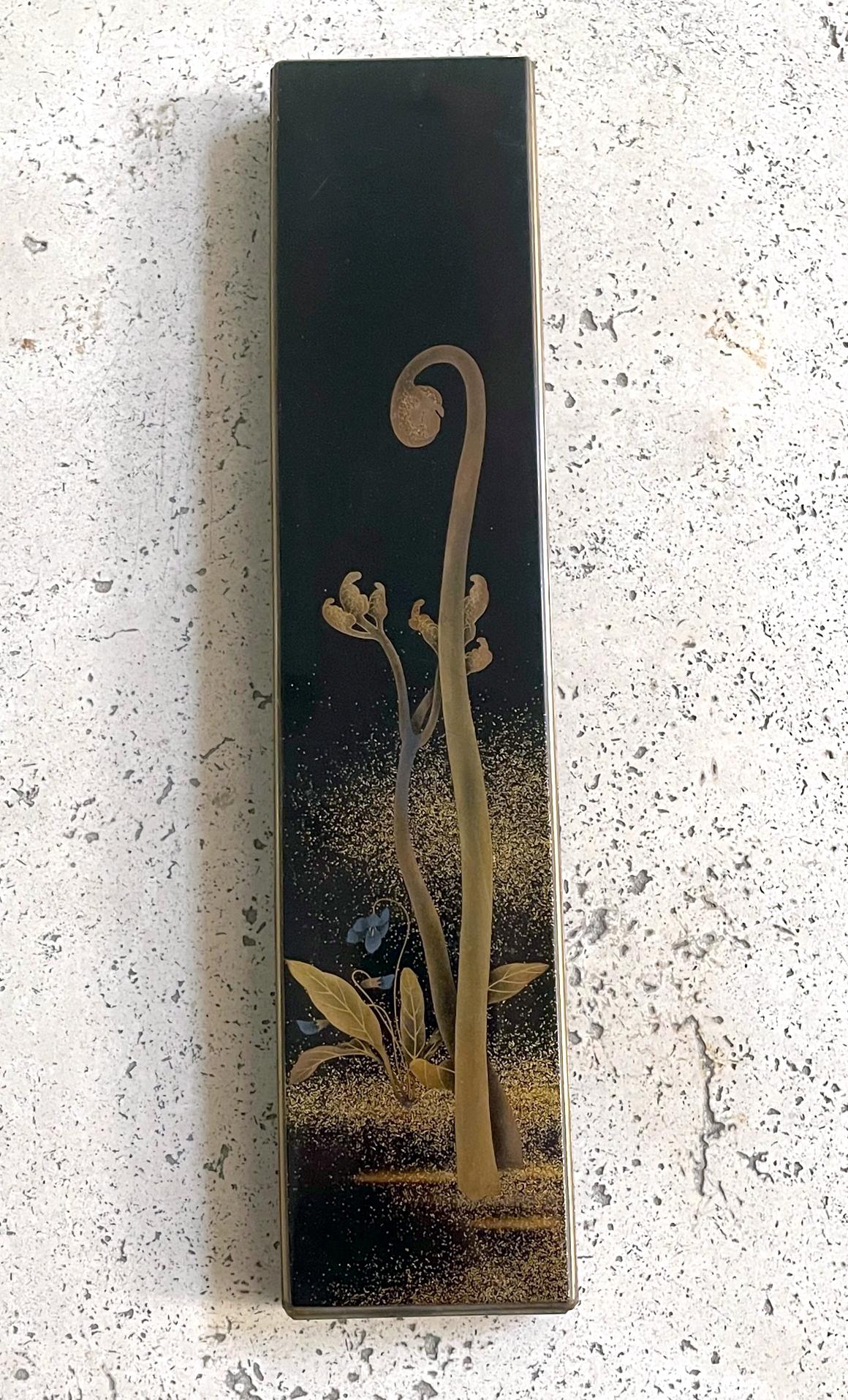 An elongated rectangular lacquer box with fine Maki-e decoration dated to late Meiji period circa 1890-1900s. The box was traditionally designed to hold poem paper slips and is called Tanzaku Bako in Japanese. The elegant piece has a slightly arched