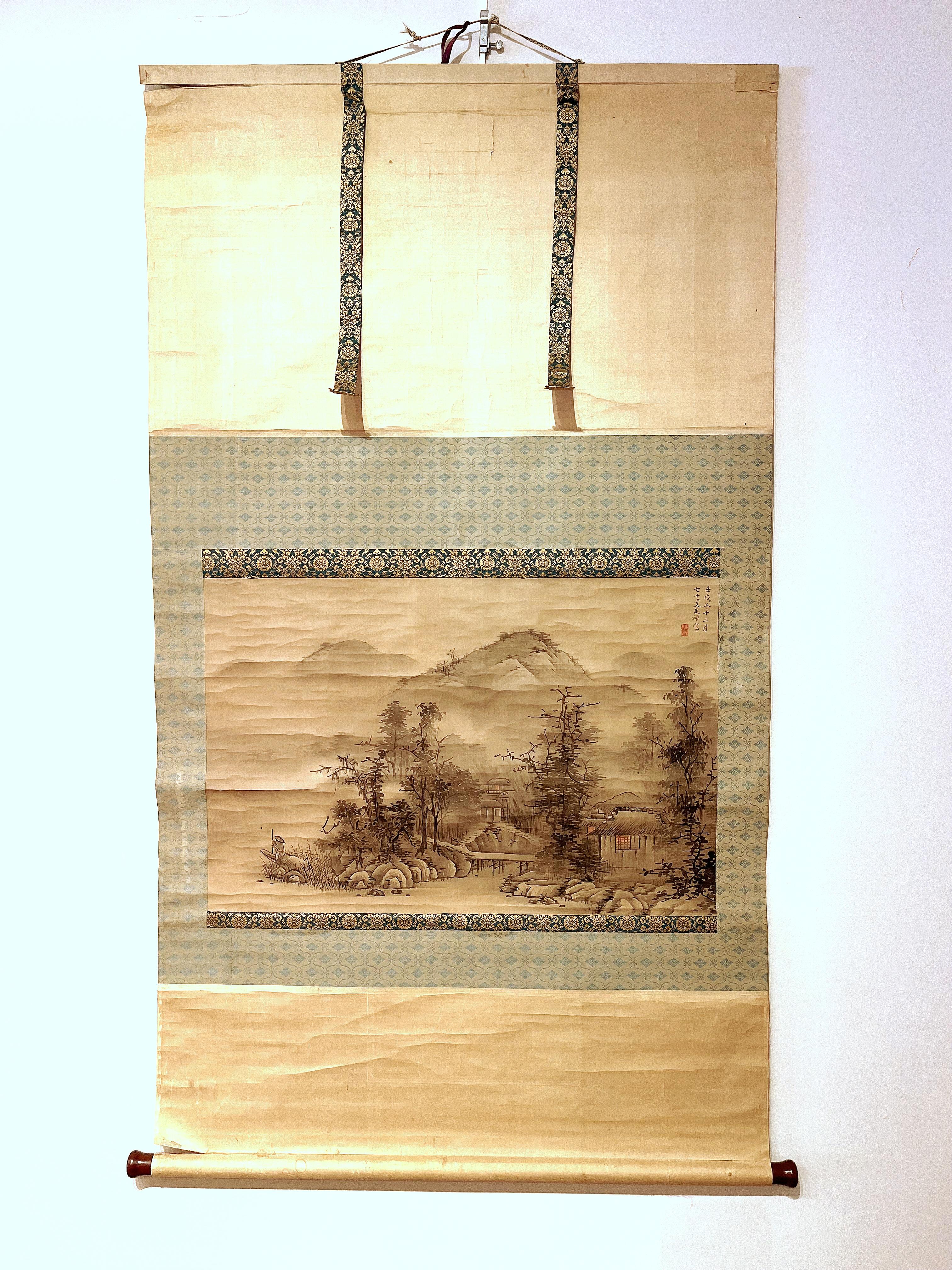 Japanese scroll painting of landscape painting depicted  village along the riverside in the mountains with fisherman
Ink and color on silk
Overall size:   53