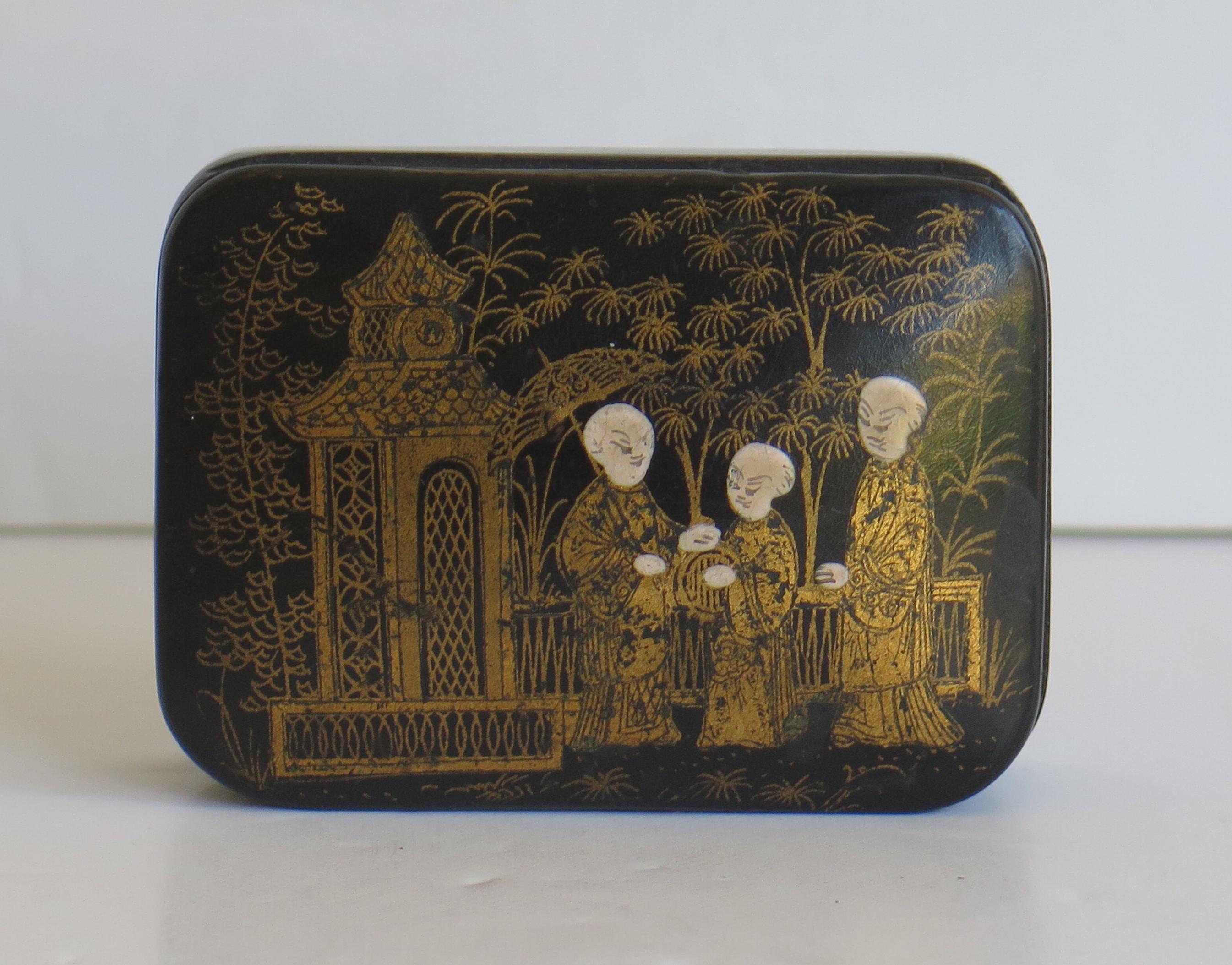 This is a good papier mâché, rectangular shaped black lacquered lidded box, hand enamelled and gilded, made in Japan during the 19th century, early Meiji period.

This rectangular shaped papier mâché box has a well fitting hinged lid, with the box