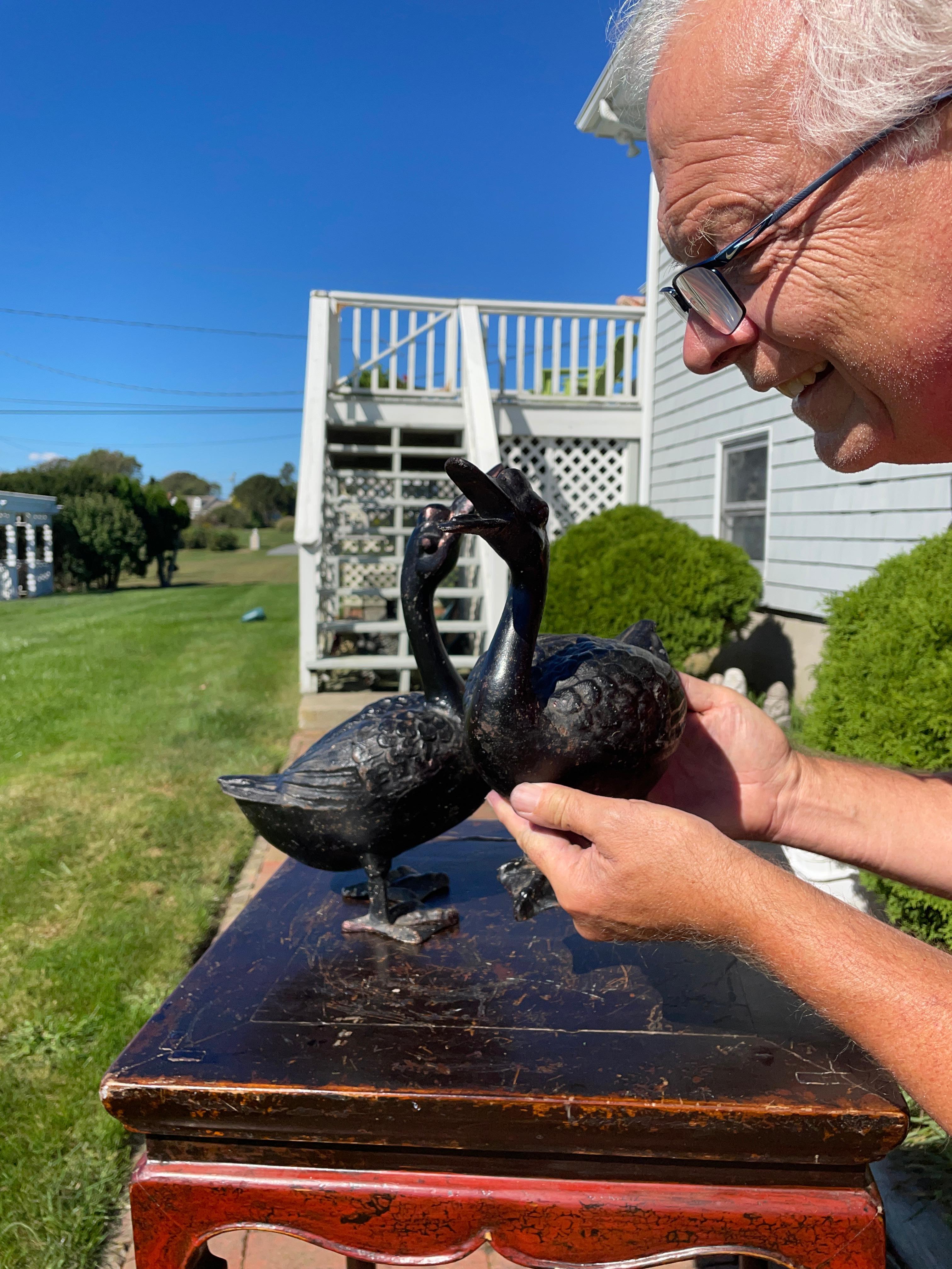 A fine matched pair (2) of large scale Japanese hand-cast garden ducks from the 1920s with highly detailed plumage, heads, tails, webbed feet, and wings.

Stamped and signed 