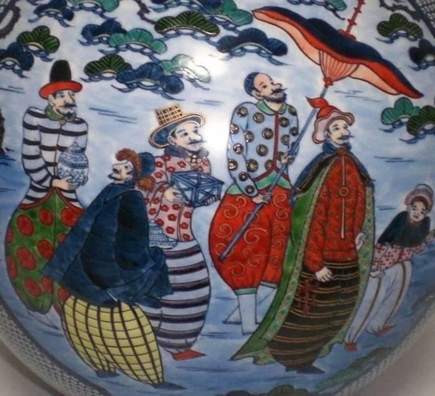 Unique exceptional Japanese contemporary large Imari porcelain vase, a signed masterpiece by a second-generation master porcelain artist of the Imari-Arita region of Japan. It is intricately hand painted in brilliant colors on a large beautiful