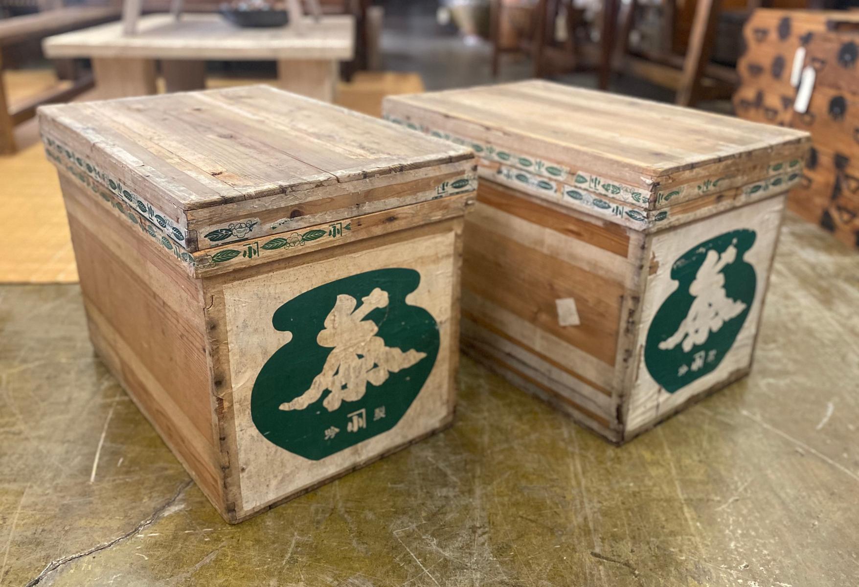 These tea boxes were lined with tin to keep loose tea fresh. One has the original tin, the other has been replaced with new tin. They each have old sticker, labels and a lot of character. They are functional as a rustic coffee table, side table or