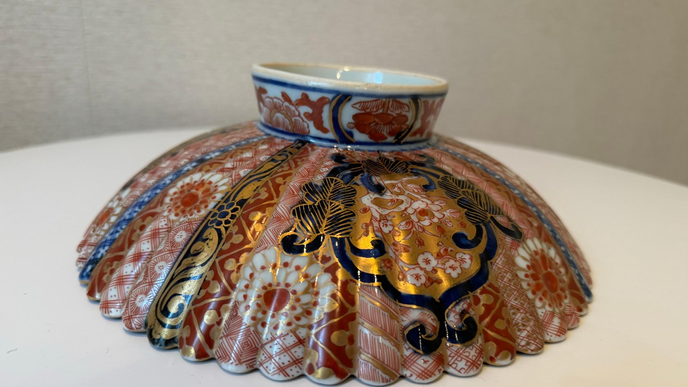 Hand-Painted Japanese Late 19th Century Meiji Raised Red Blue Porcelain Charger, circa 1875 For Sale