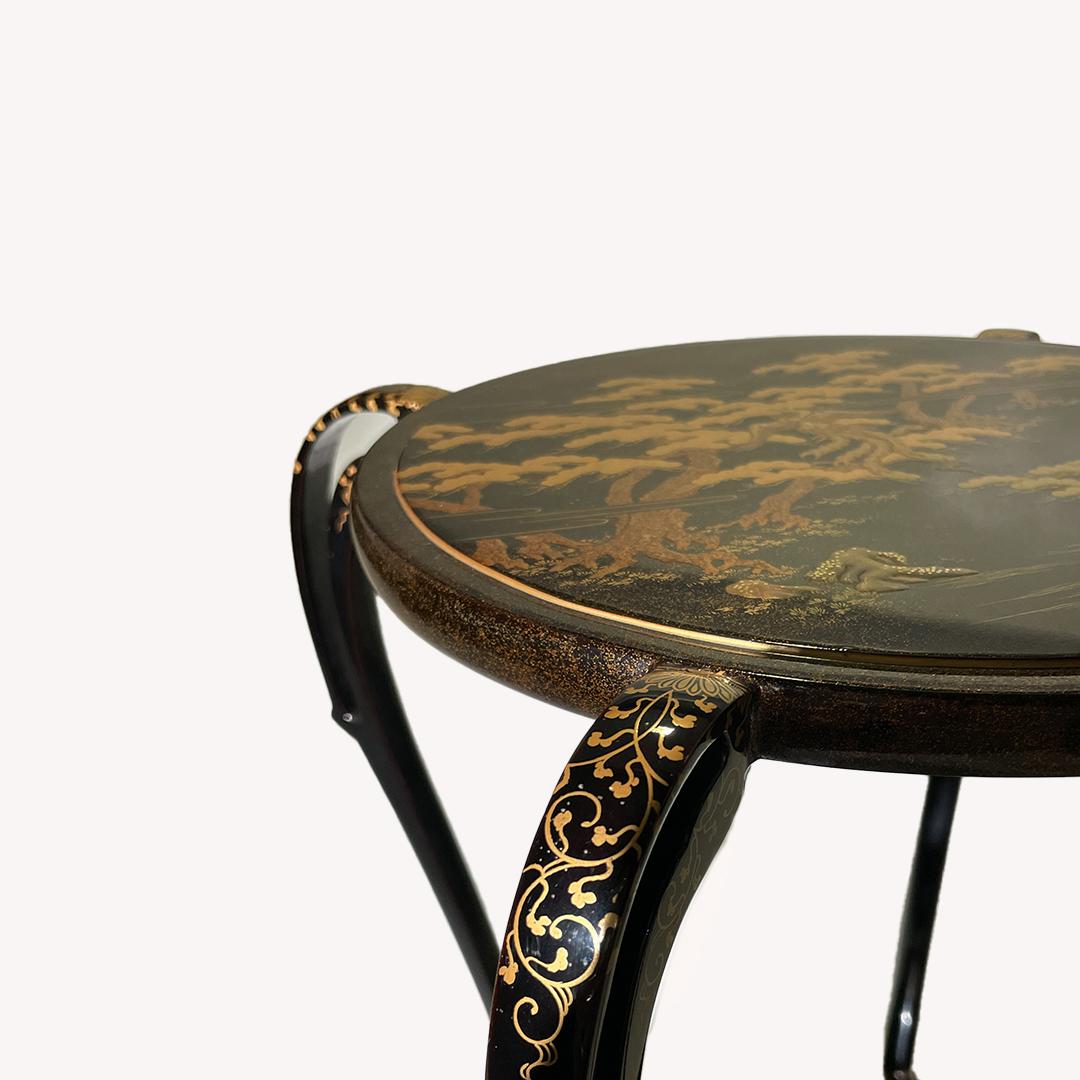 This maki-e stand expressed by a graceful curve was made in Meiji period. 
This type of stand is displayed as a central table in the most important part of Japanese alcove.

It features a beautiful gold lacquer work of 