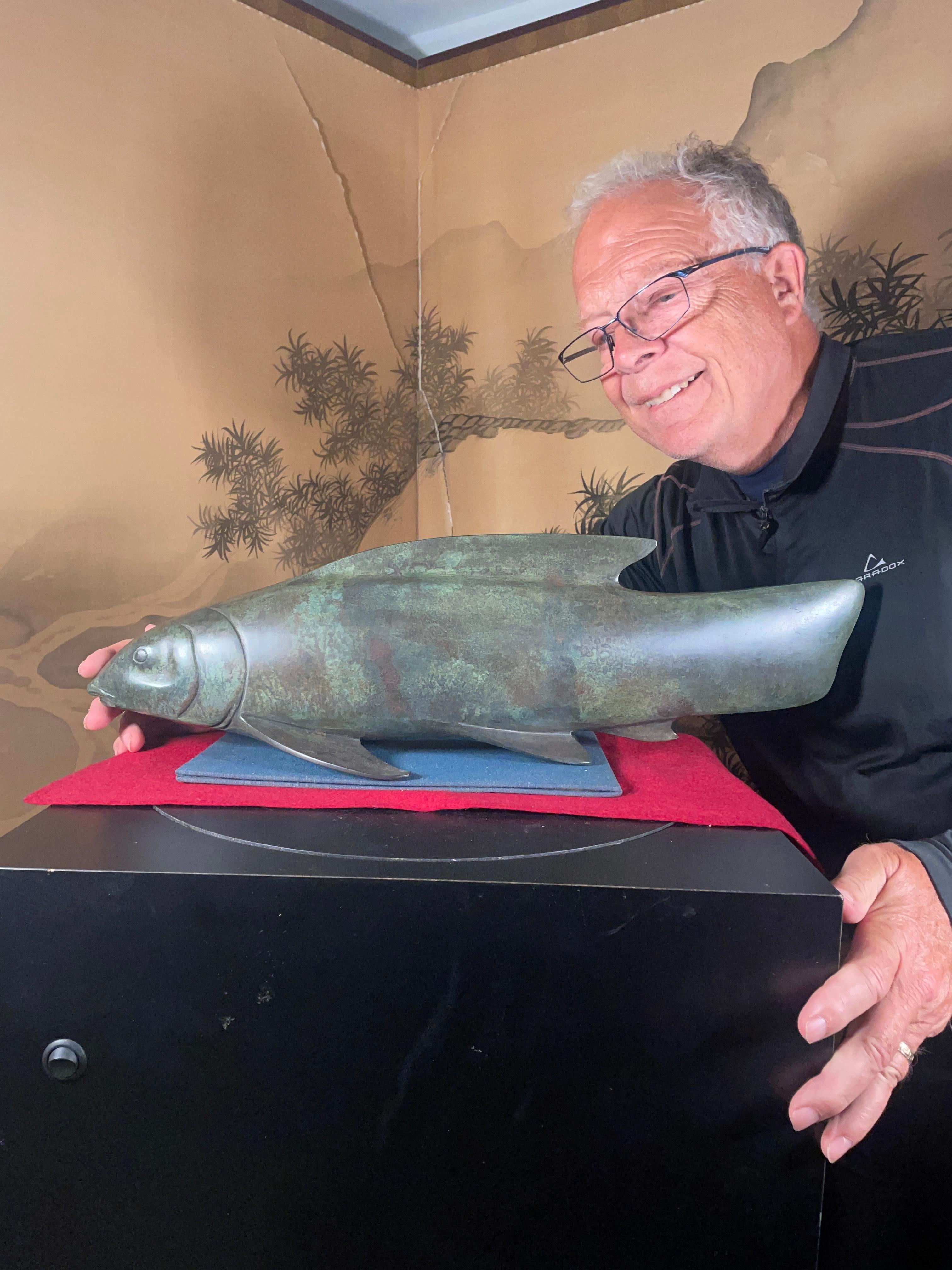 A giant hand cast serene bronze trophy koi fish sculpture Yuuri signifying calm and comfort 
by Japanese master metal artist, Ota Ryohei.

Signed on base official label still present.

Original and official documents included.

The large scale 22.5