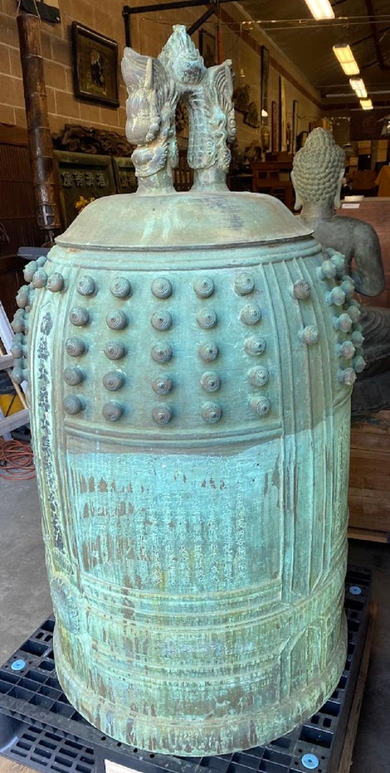 Massive Japanese Bronze Bell Inscribed and dedicated to humanity and world peace.

History:
Many large Japanese bronze temple bells were requisitioned and smelted.
by the government before and during WWII. This huge bell obonsho was cast after the