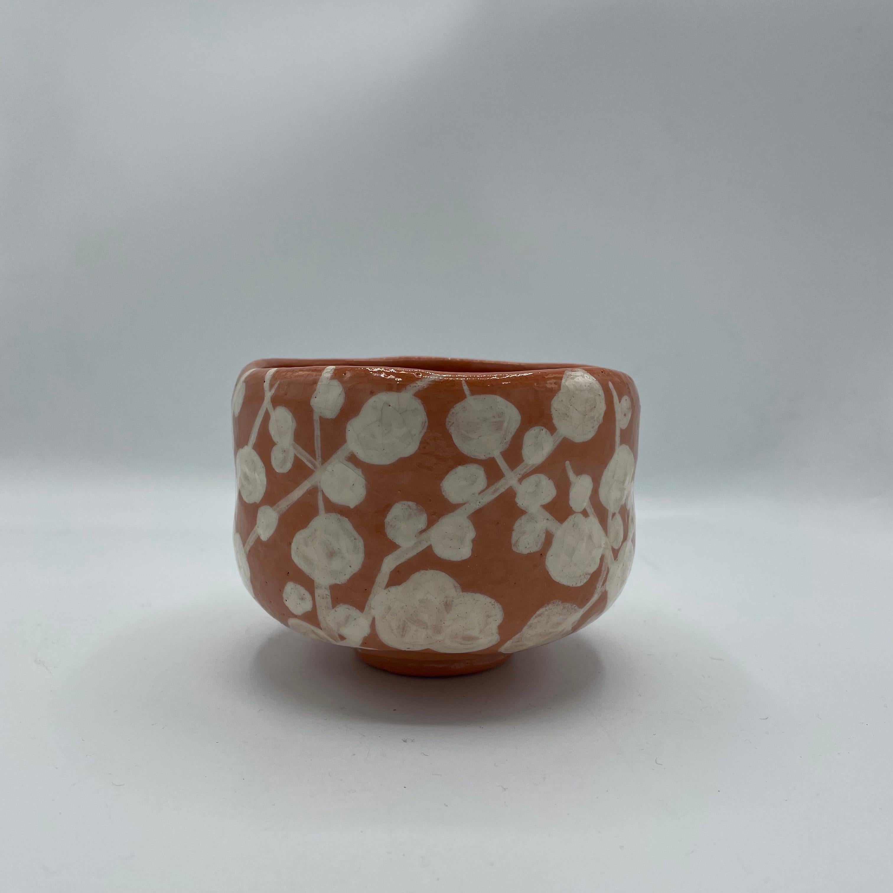 This is a tea bowl for matcha. 
It was used to use during tea ceremony. 
This bowl is made with porcelain and it will come with a wooden box. 
This bowl was made with style Raku (Raku yaki). It was made by Rakunyu Yoshimura.

Raku ware is a type of