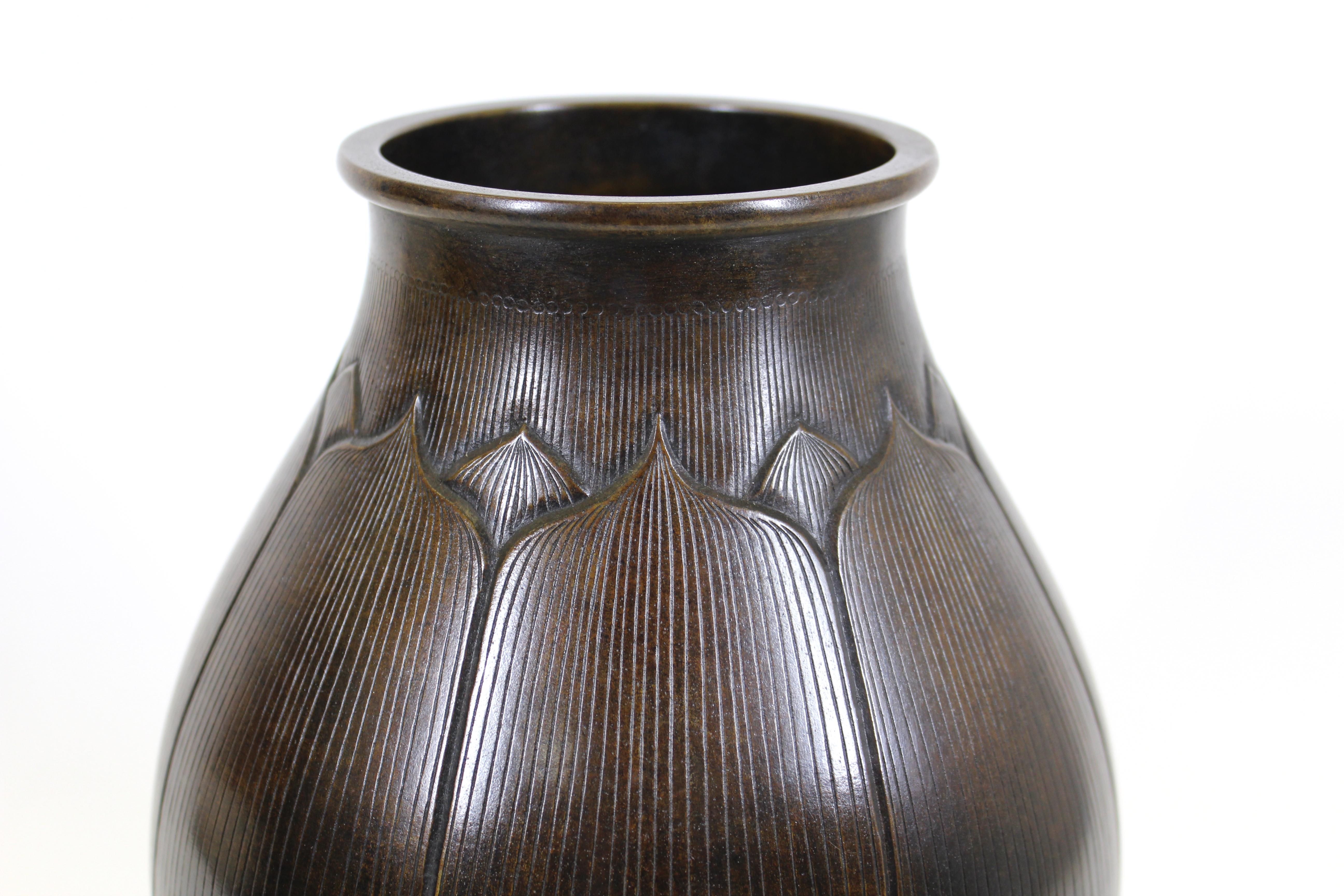 Japanese Meiji period Art Nouveau bronze vase in shape of a lotus, hand incised detailing and rare chocolate brown patina, circa 1900.