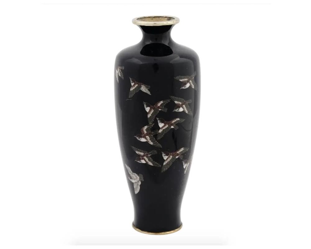 An antique Japanese copper vase with cloisonne enamel design. Late Meiji period.
Elongated vase with pronounced neck.
Black body decorated with images of sparrows.

Collectible Oriental Decor For Interior Design.

Dimensions: H 6 in. All