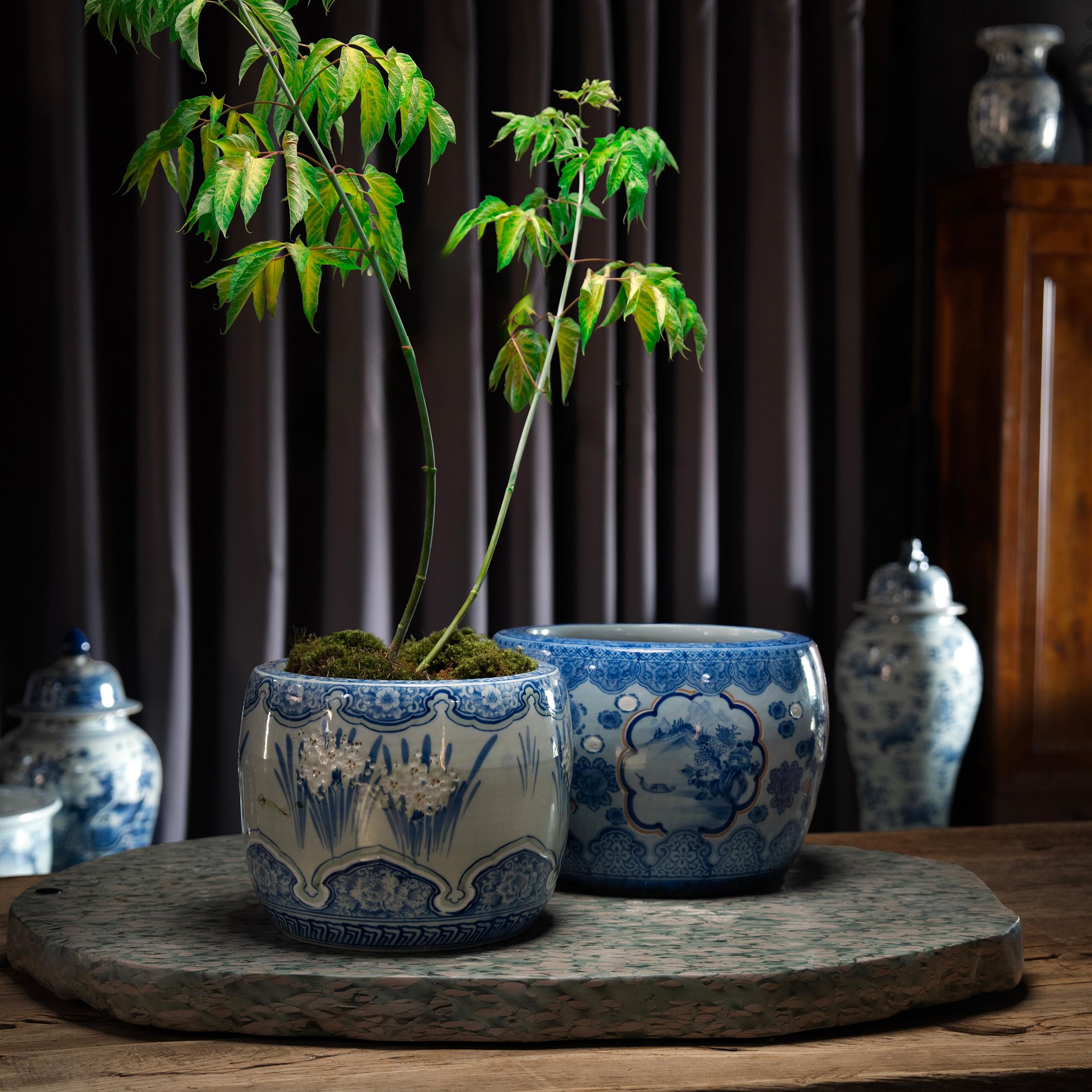 Designed to hold glowing embers, hibachi vessels were used for cooking or as a source of heat in Japanese homes. Ceramic examples such as this were introduced during the Meiji period (1868-1912) as an alternative to larger, copper-lined wooden