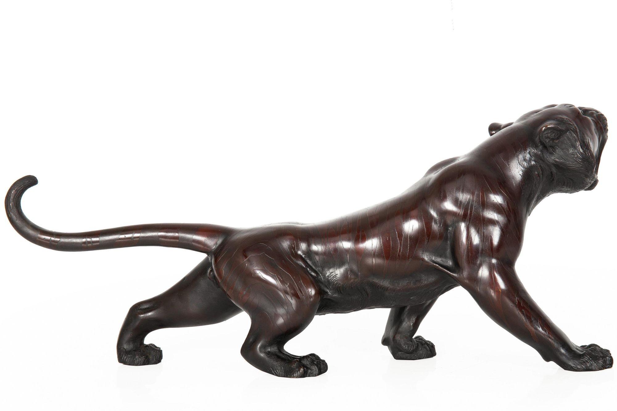 TSUNEMITSU
Japan, Meiji Period (1868-1912)

A Roaring Tiger

Reddish-brown patinated bronze  signed to the underside 常光 (Tsunemitsu)

Item # 311TPX29P

A brilliant example of a Roaring Tiger, this fine Meiji Period (1868-1912) okimono is executed in