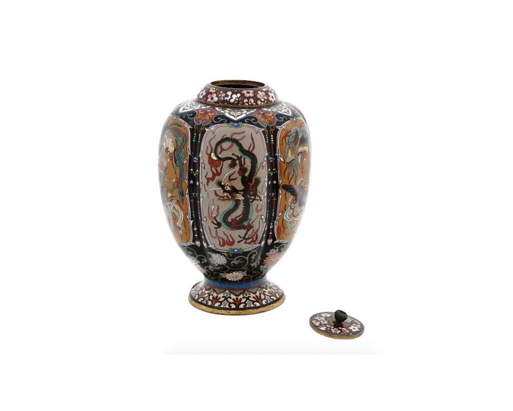 A Japanese Meiji Era Cloisonne Enamel Dragons and Ho Ho Bird Lobed Lidded Jar In Good Condition For Sale In New York, NY
