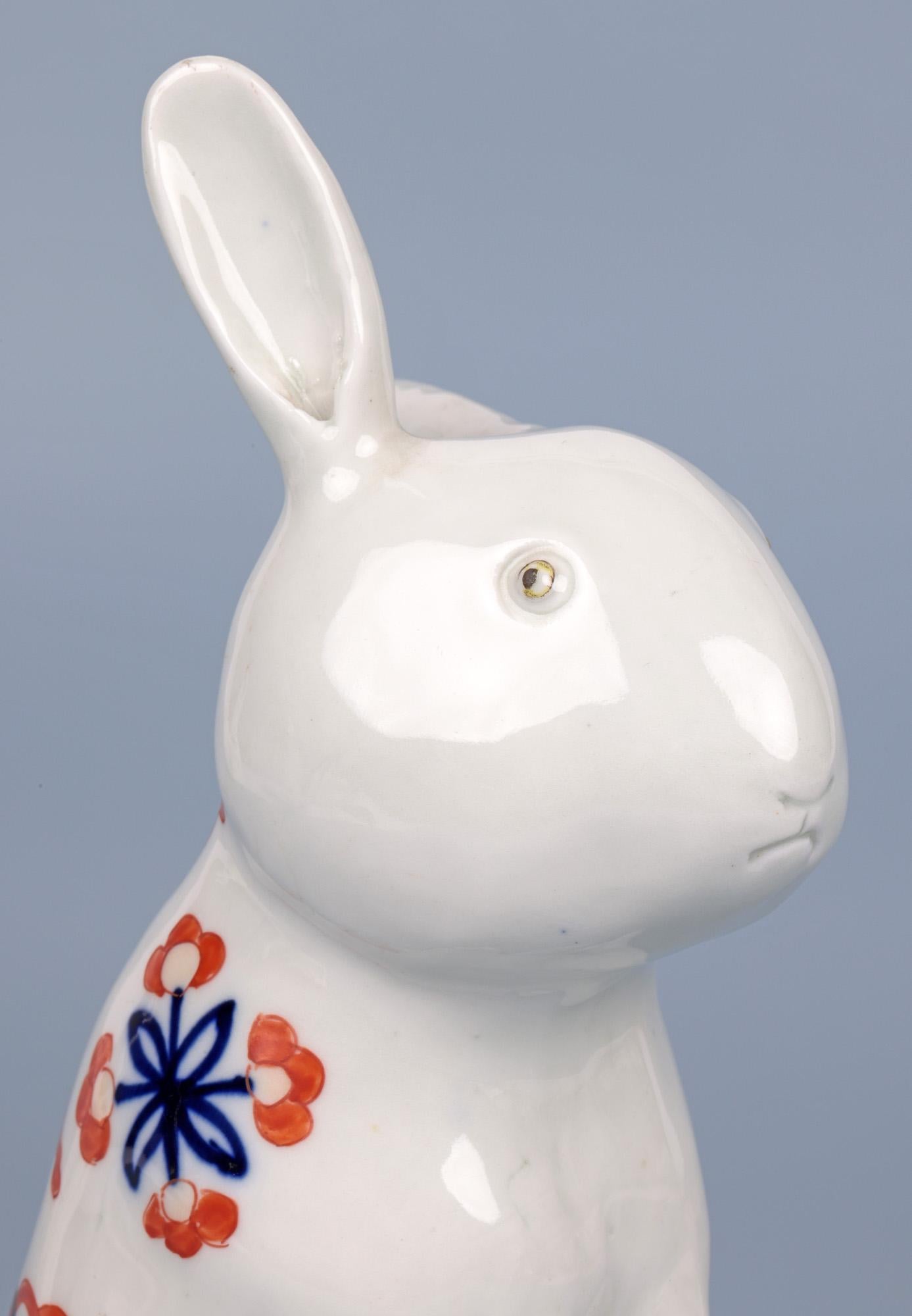 A delightful and amusing Japanese Imari study of a seated rabbit dating from the late Meiji period, early 20th century. The Rabbit, made in porcelain has a dis-proportionate head to body and with short limbs. The rabbit sits on his haunches with its