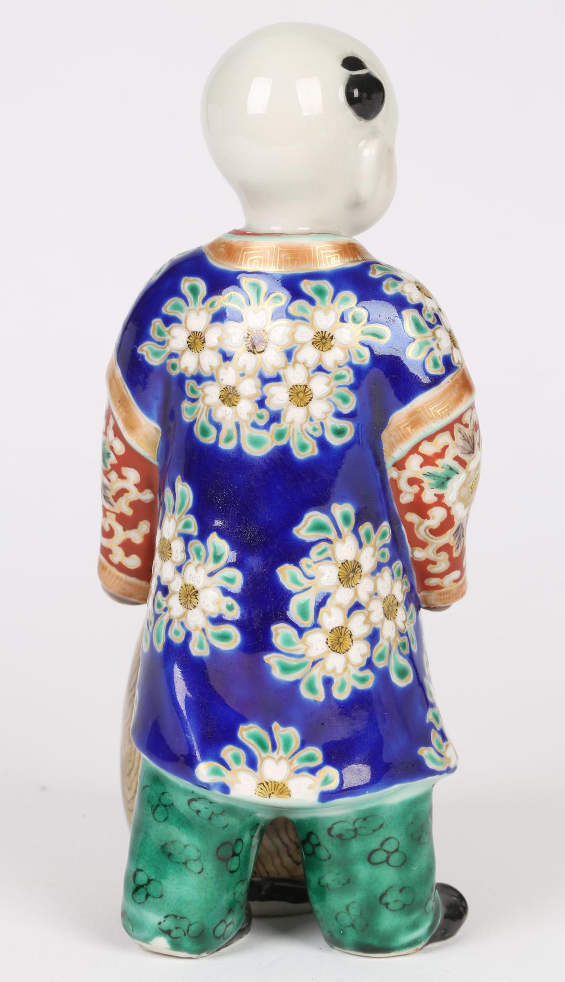 Glazed Japanese Meiji Kutani Porcelain Drummer Boy Figure