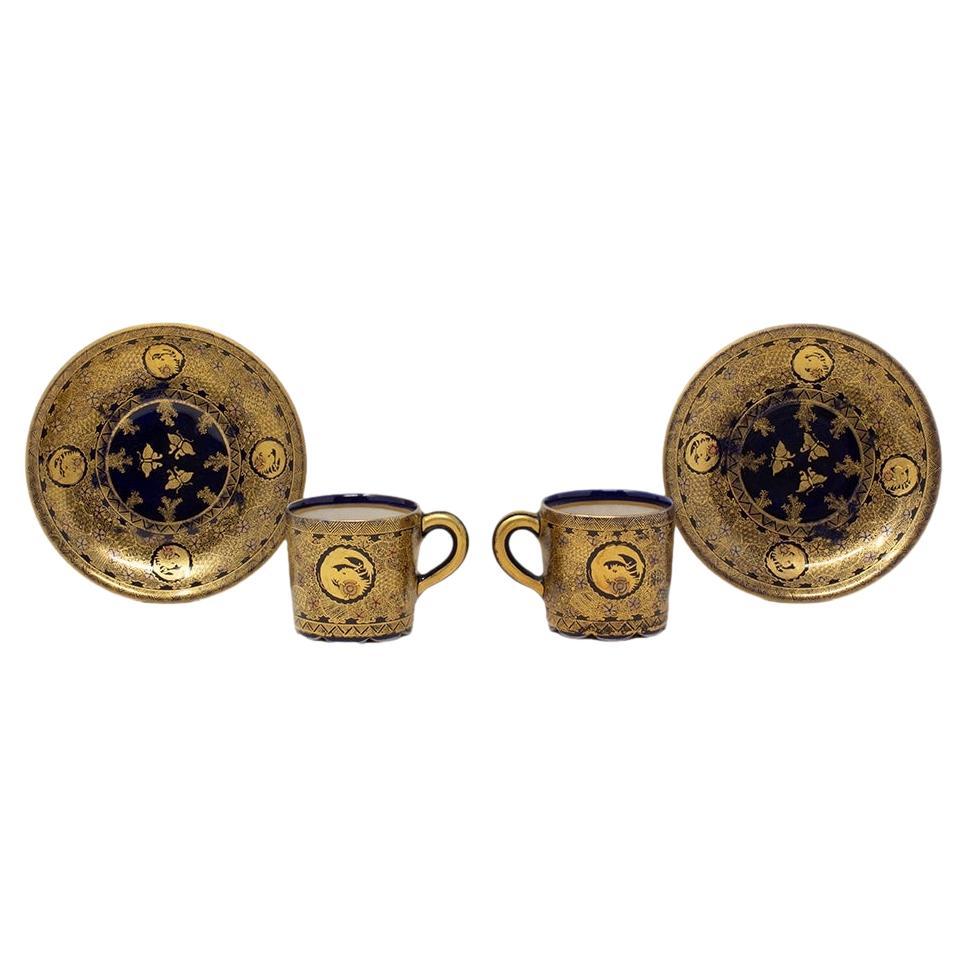 Pareja de taza y platillo Satsuma japoneses del periodo Meiji (1868-1912) de Kinkozan