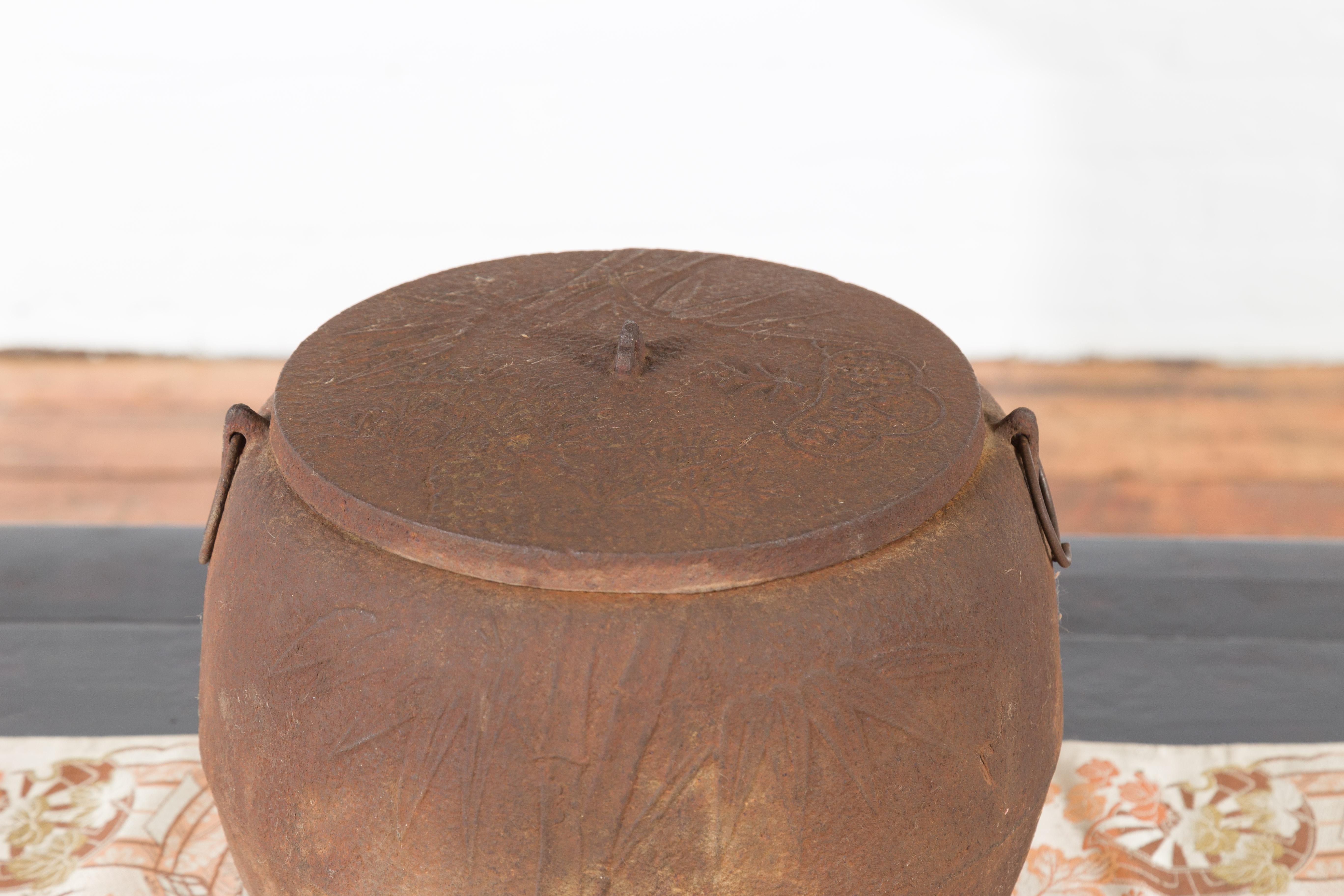 20th Century Japanese Meiji Period 1900s Distressed Iron Cooking Pot with Foliage Motifs For Sale