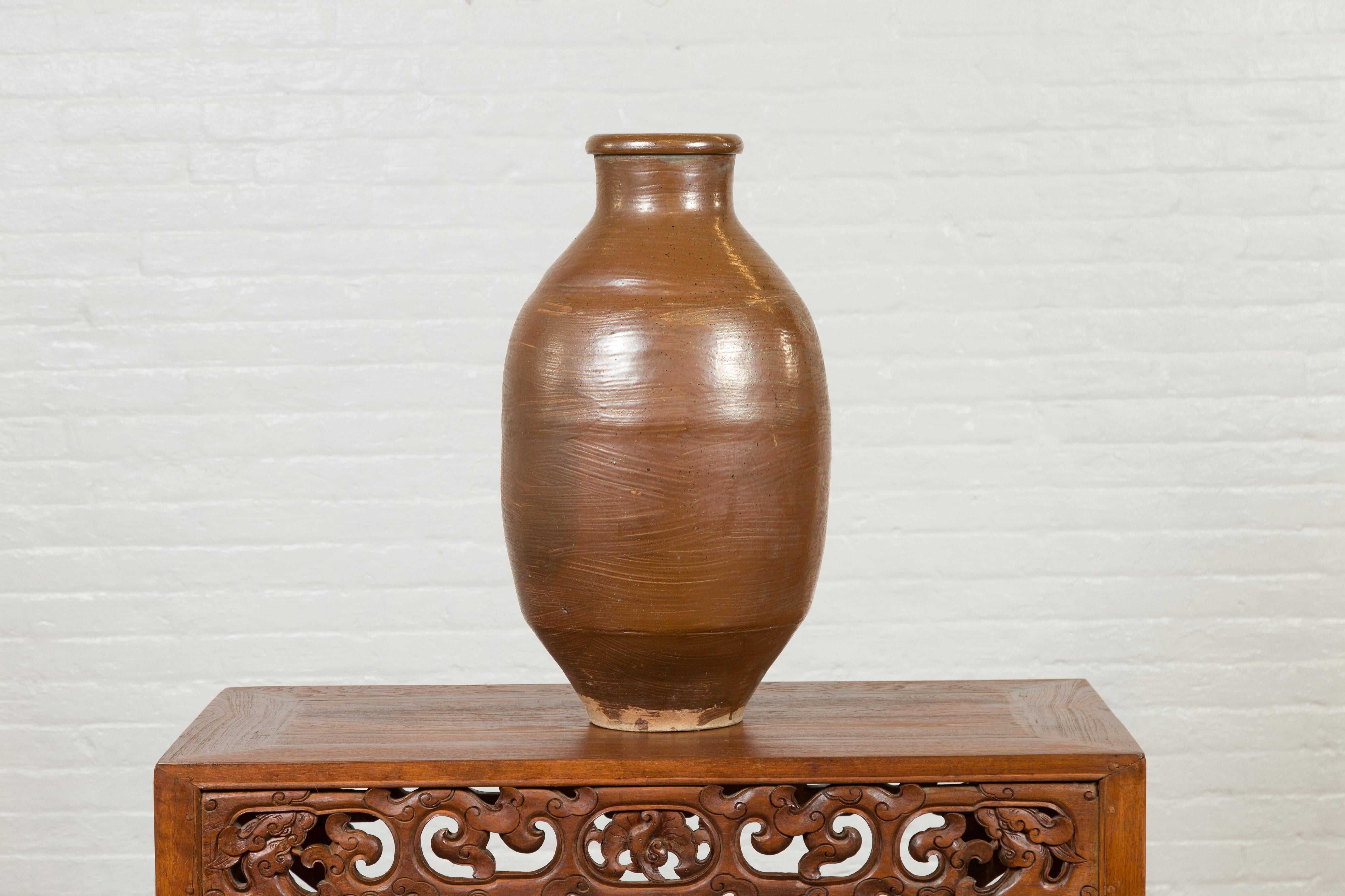 Pottery Japanese Meiji Period 19th century Water Jar with Brown Monochrome Patina For Sale