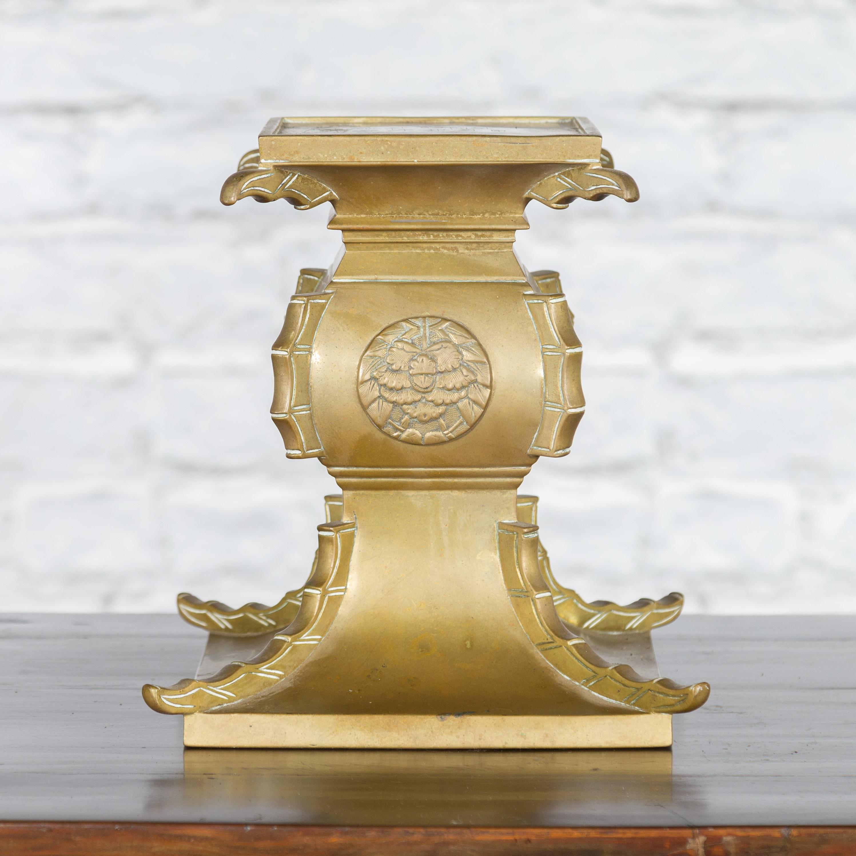 Japanese Meiji Period Brass Candle Holder with Scrolls and Medallions For Sale 1