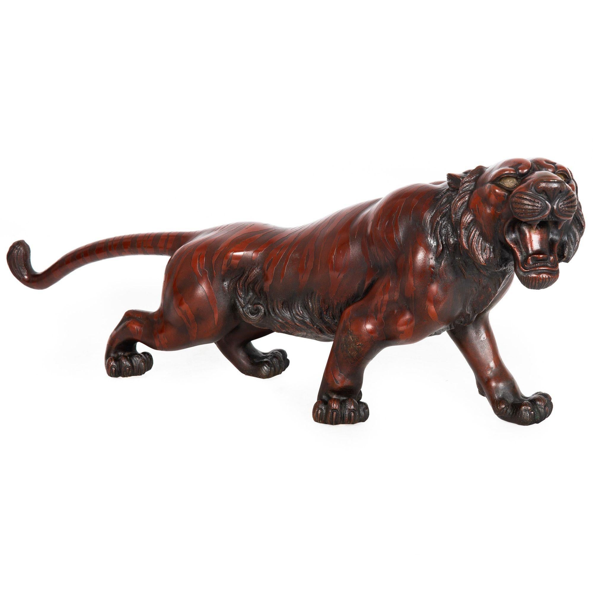 MEIJI PERIOD
Japan

A Roaring Tiger

Reddish-brown patinated bronze  signed to the underside  probably cast circa the first quarter of the 20th century

Item # 311ZDK29A

A brilliant example of a Roaring Tiger, this fine Meiji Period okimono is