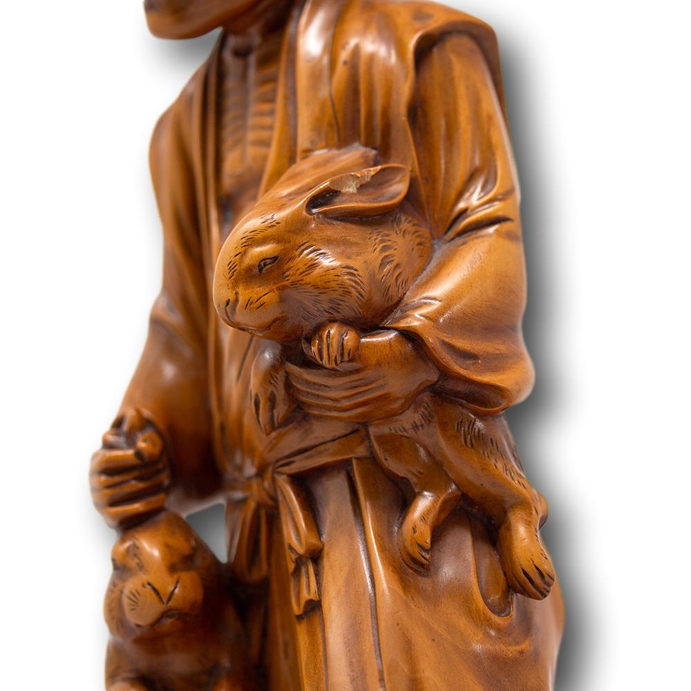 Japanese Meiji Period Carved Wood Okimono Man with Rabbits For Sale 2