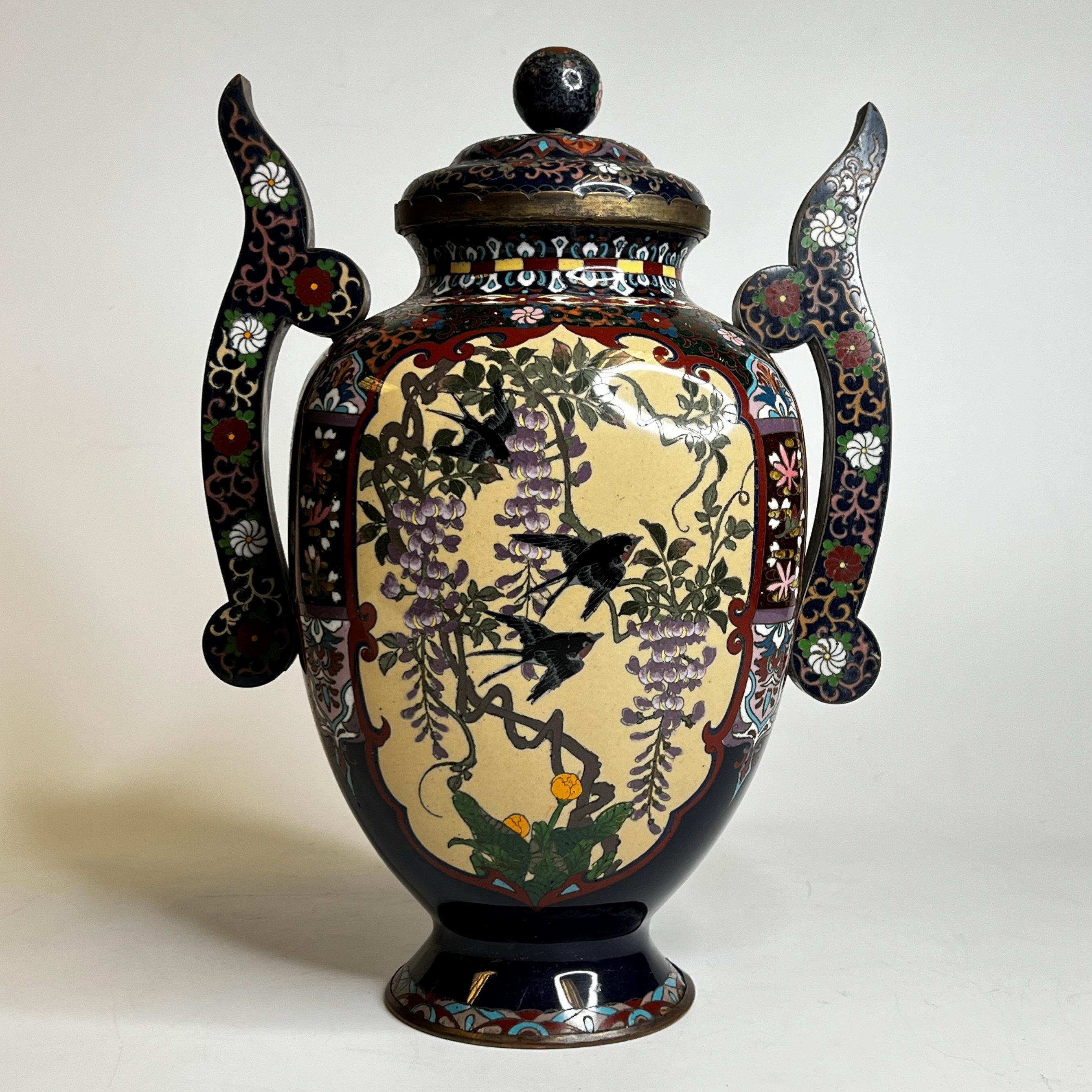 Very fine quality Japanese Meiji period Cloisonne Enamel covered vase with birds and wisteria motif.
