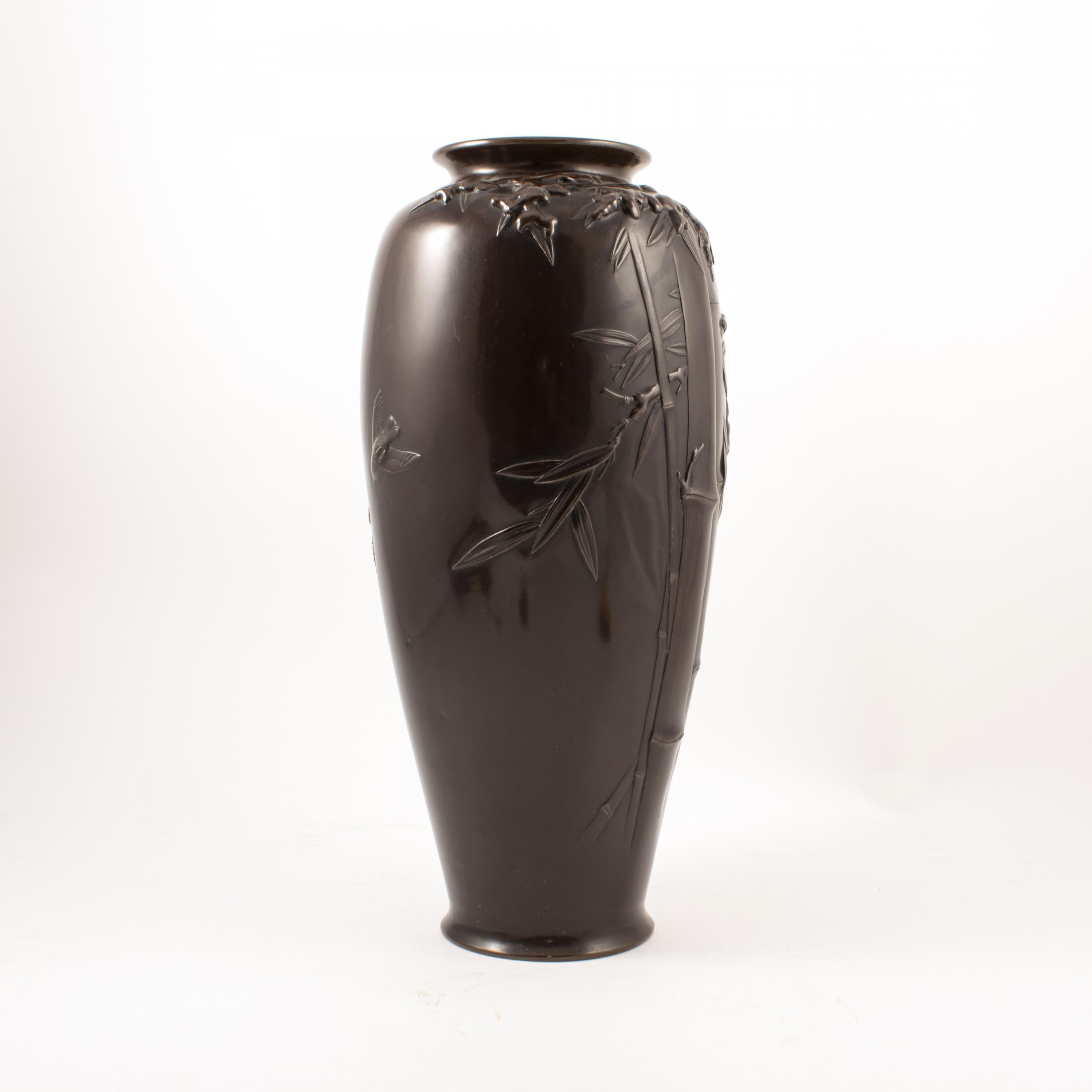 Japanese dark patinated bronze vase. Embossed with bamboo and bird’s motifs.
Late Meiji period, circa 1900.
Base has makers mark / signature.