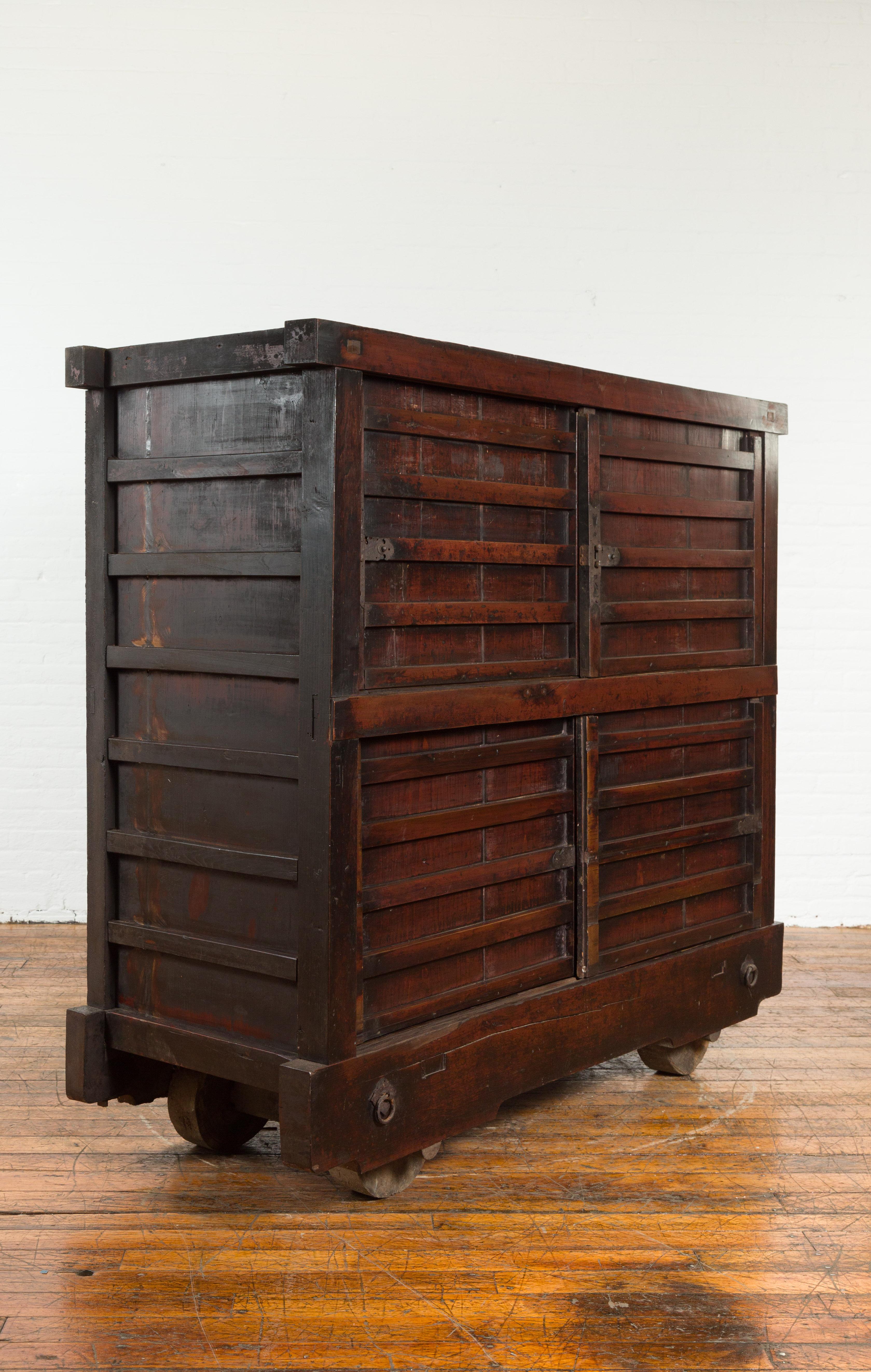 Wood Japanese Meiji Period Late 19th Century Merchant's Chest Mounted on Wheels For Sale