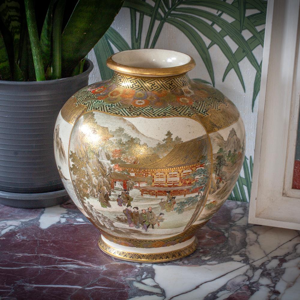 From our Japanese Satsuma Collection, we are delighted to offer this Japanese Quatrefoil Satsuma Vase by Choshuzan. The Satsuma vase of beautiful quatrefoil globular shape with rolled neck and spread foot is decorated with four large interlocked