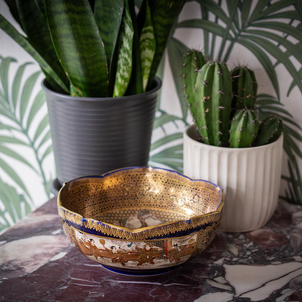 From our Japanese collection, we are delighted to offer this Japanese Meiji period Satsuma Bowl by Kinkozan. The earthenware bowl with pinched rim extensively decorated on both the exterior and interior. The bowl with a cobalt blue base glaze