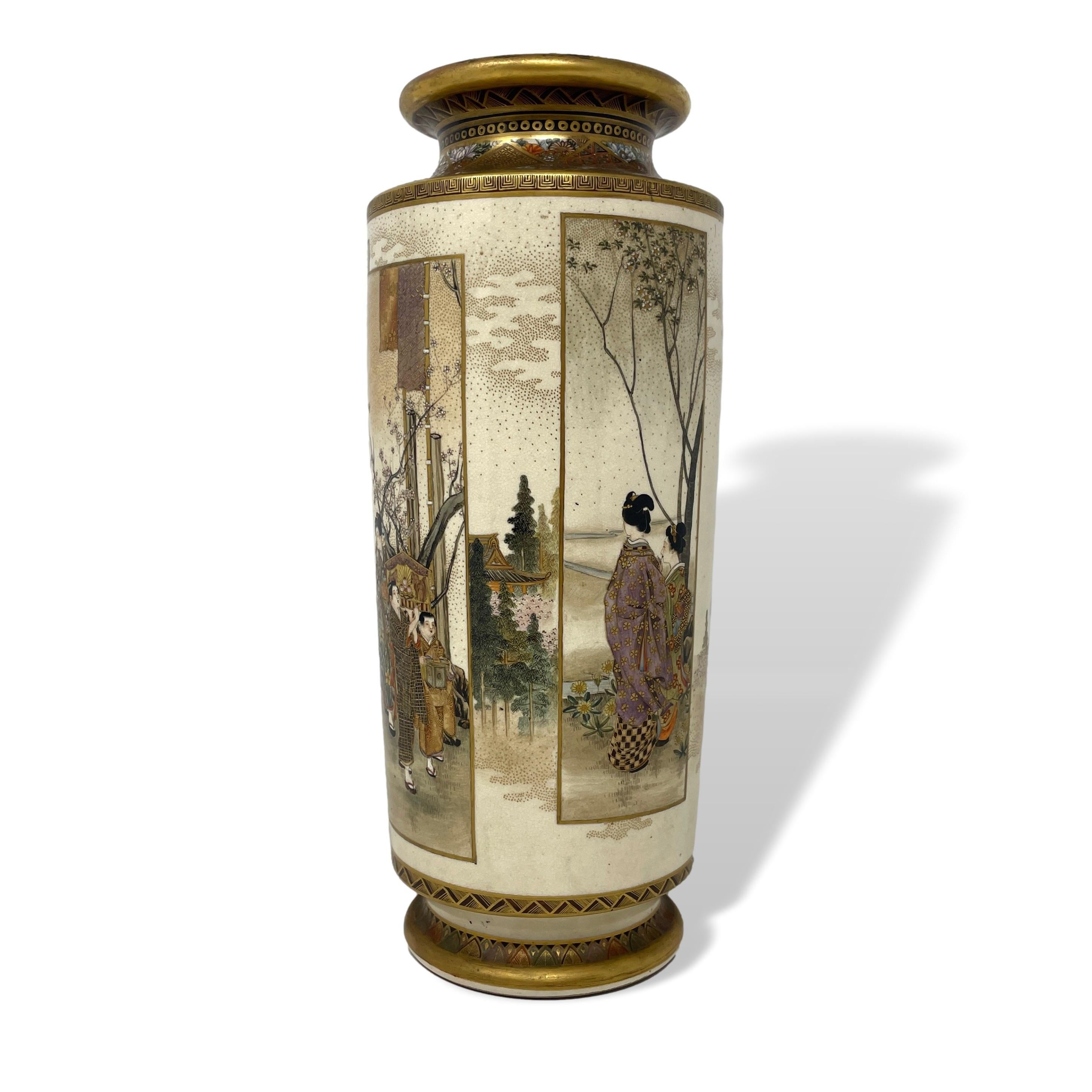 As part of our Japanese collection we are thrilled to offer this Japanese Meiji period sleeve vase. The vase of cylindrical form with pinched neck, rolled top and bottom rim and large opening. Decorated beautifully with multiple scenes overlaying a