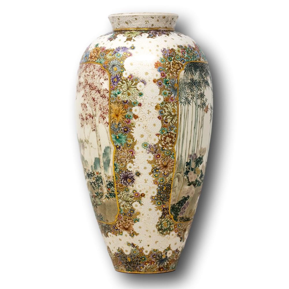 Fine & large satsuma vase dating to the Meiji period. The vase of exceptional decoration potted in an ovoid form with bulbous top and tapered bottom, tight pinched neck and flared opening. The vase decorated throughout with beautifully hand painted