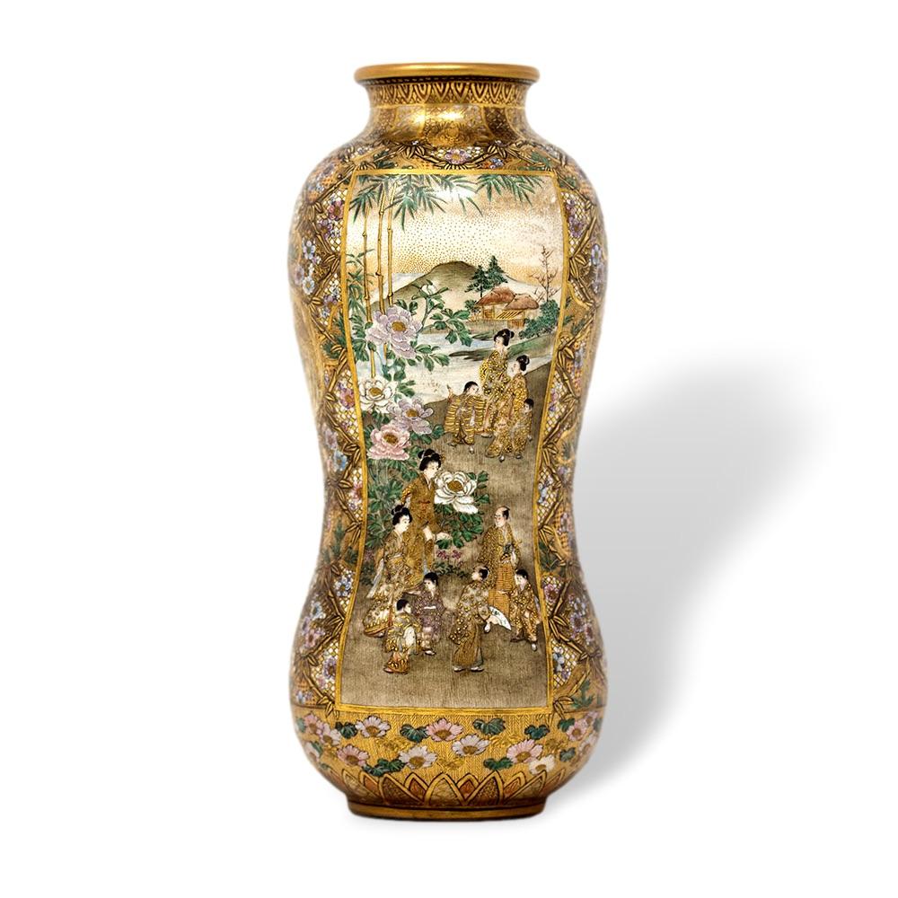 Fine and unusual shaped Japanese Satsuma vase. The vase shaped similar to a double gourd with two bulbous sections and a slightly pinched centre, the top rim tightly pinched also with a slight roll. The vase decorated extensively with gilt scrolling
